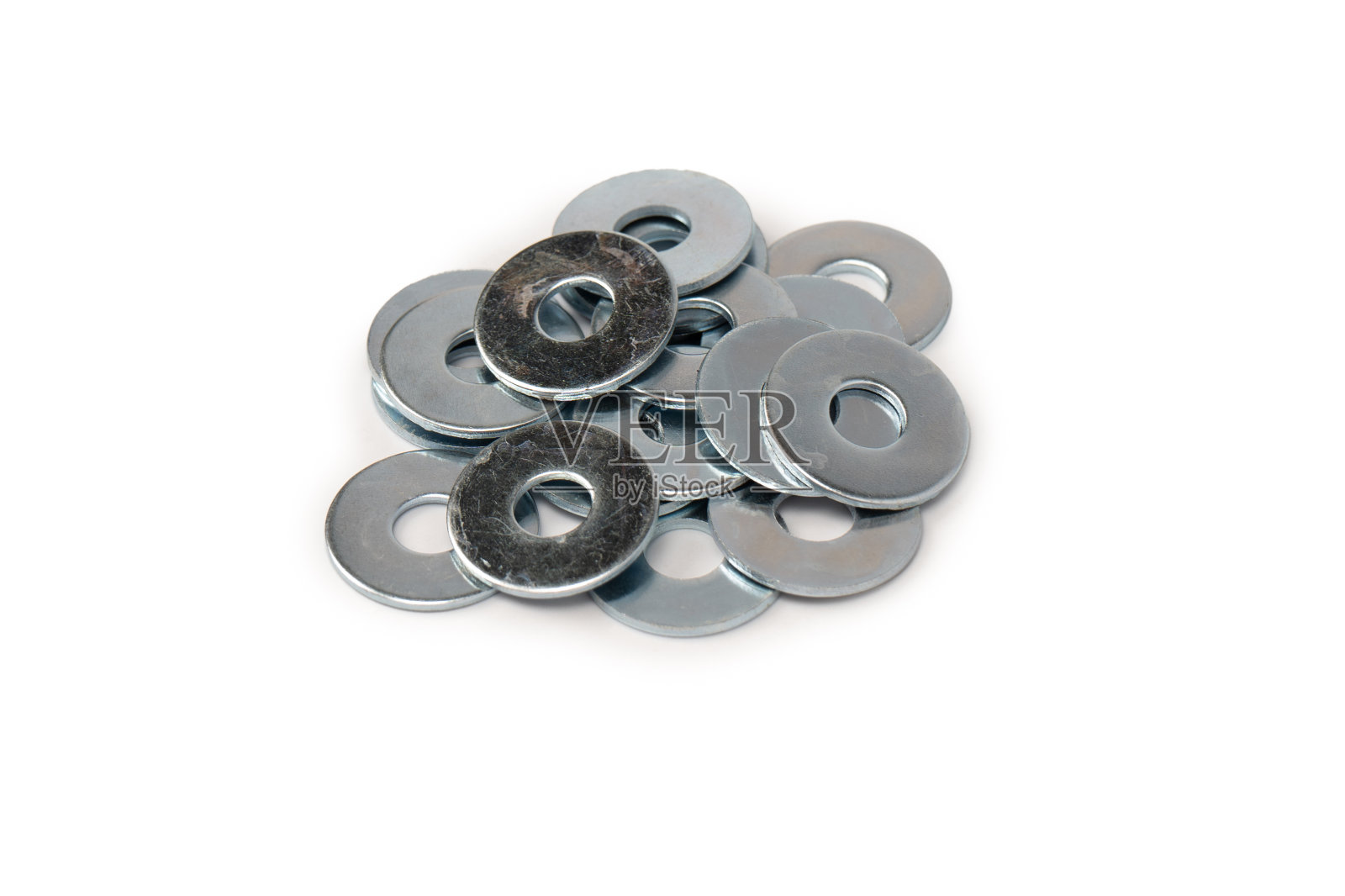 金属垫圈隔离在白色背景上。照片摄影图片