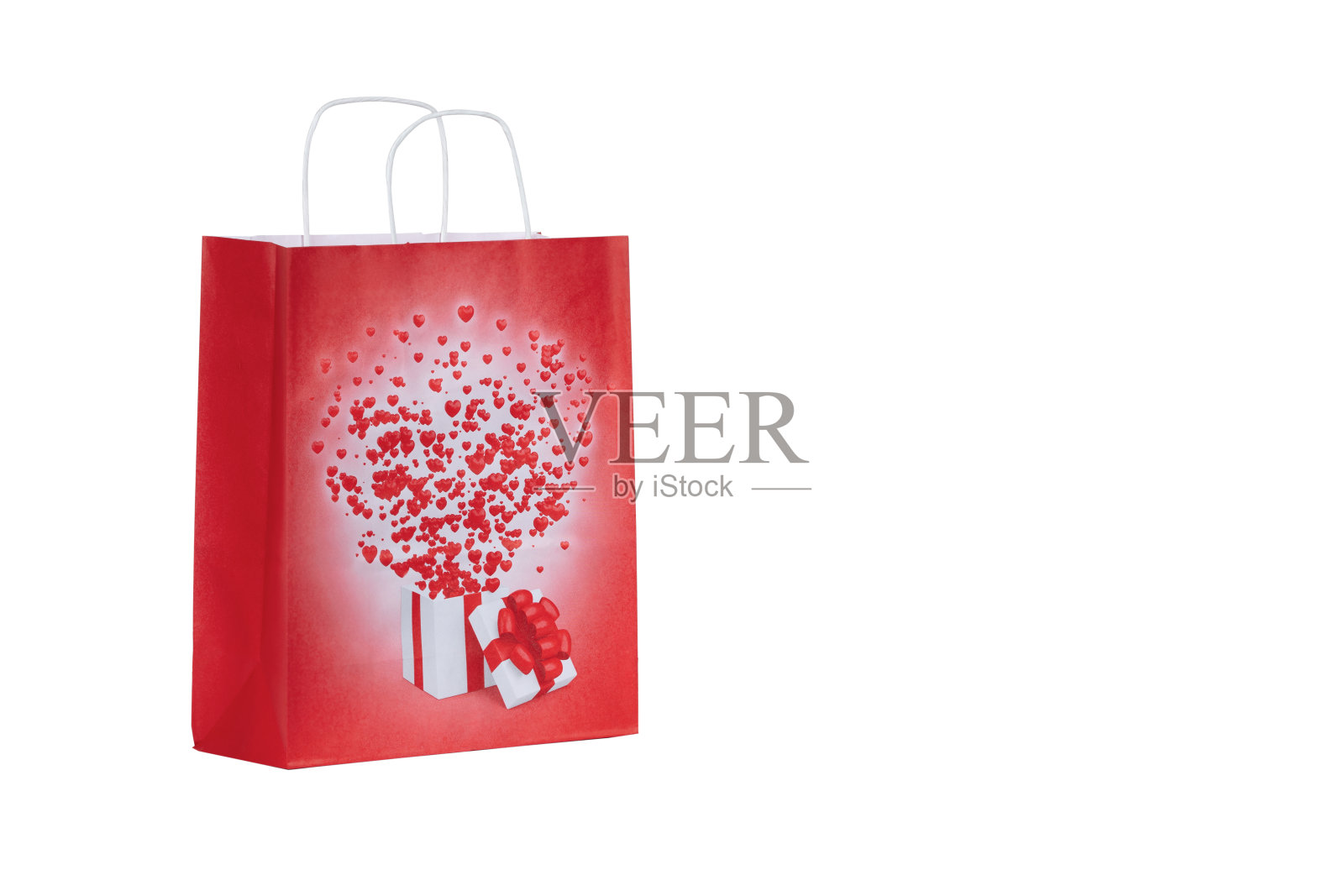 充满活力的红纸购物袋与白色手柄隔离在白色背景零售，礼品包装，和品牌模型设计照片摄影图片
