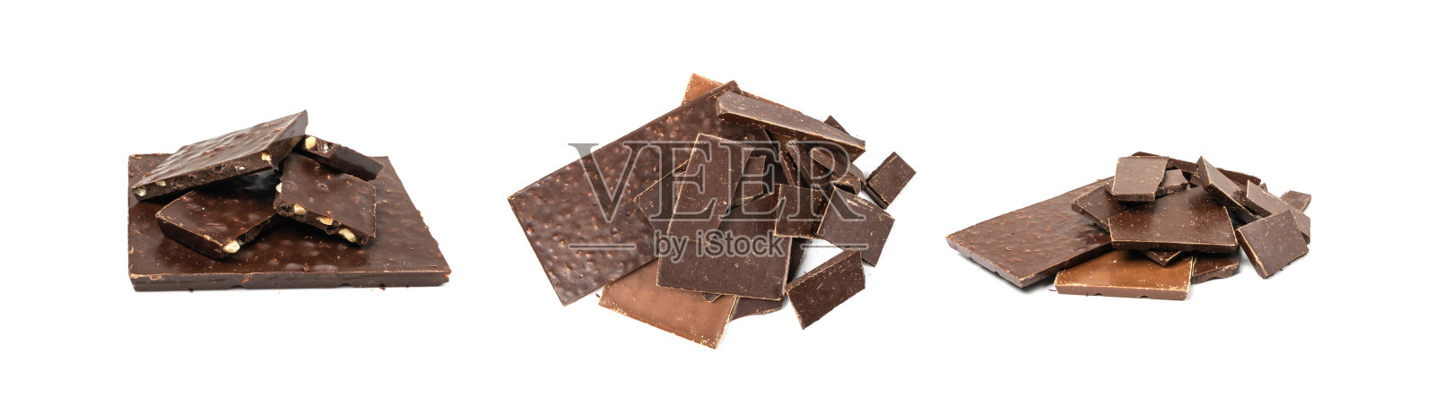 碎坚果巧克力棒堆栈，孤立。牛奶巧克力方形块，立方体，小块堆，巧克力照片摄影图片