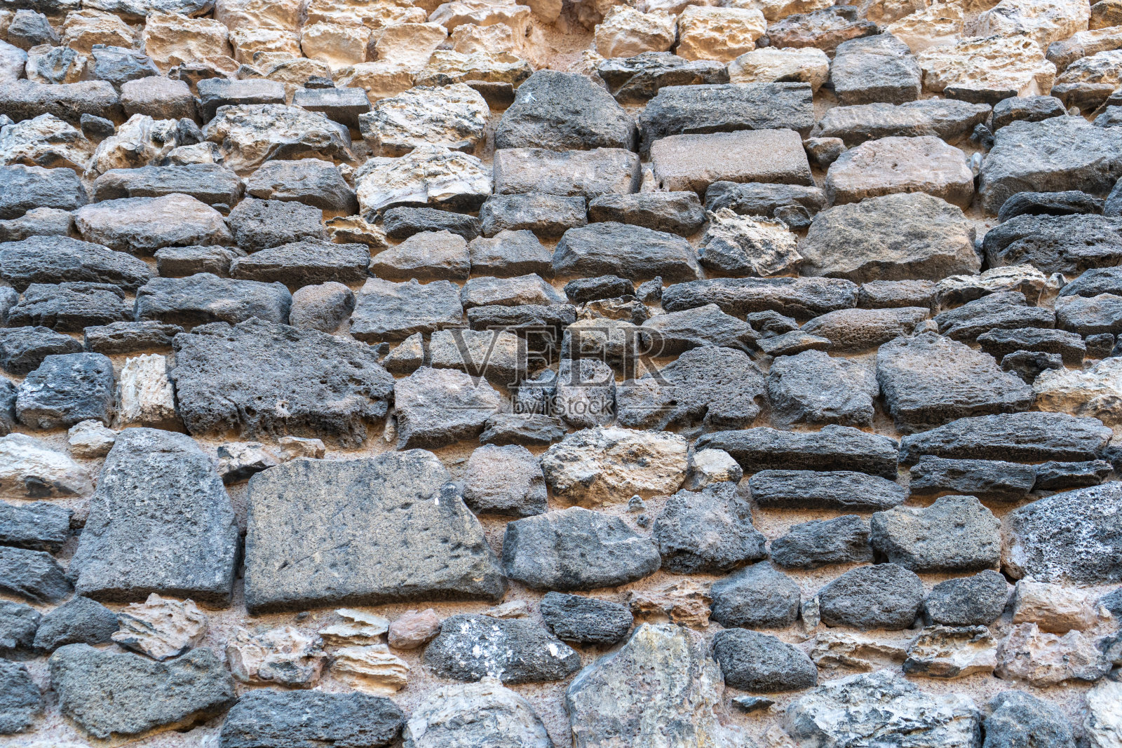 旧石墙纹理背景，岩石块墙，古代砖栅栏，复古石墙照片摄影图片