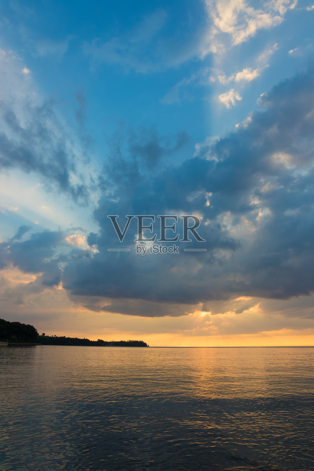 岩石处的日落照片摄影图片