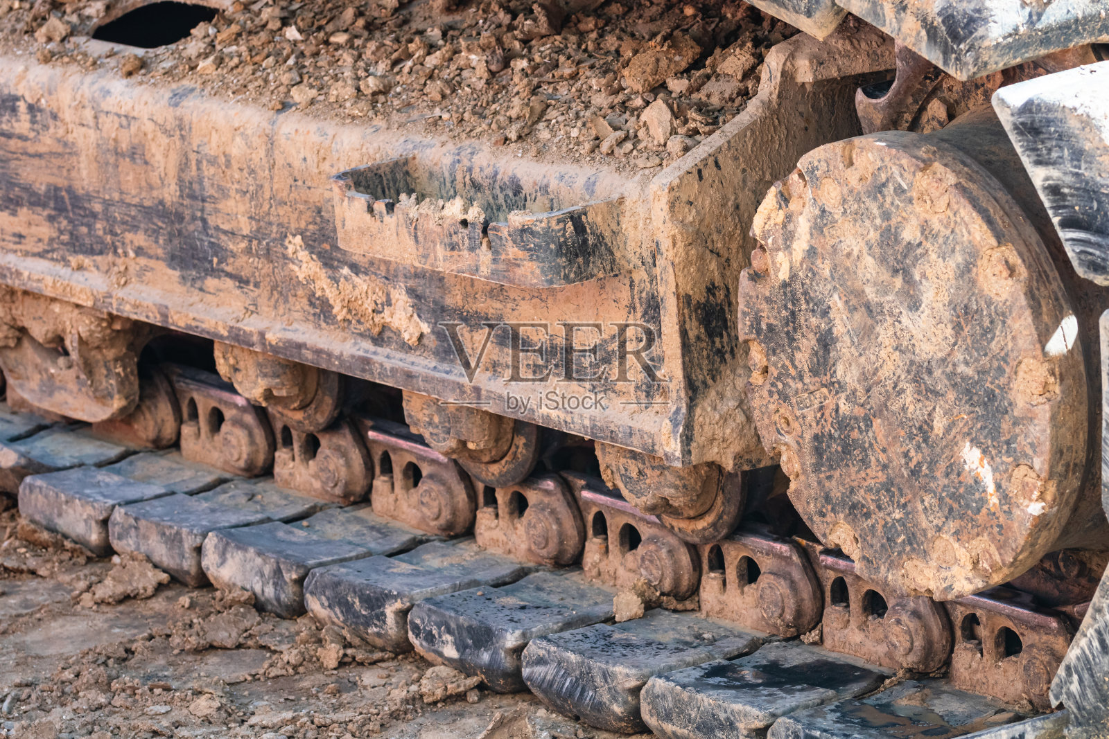 工业挖掘机在建筑工地的工作细节照片摄影图片