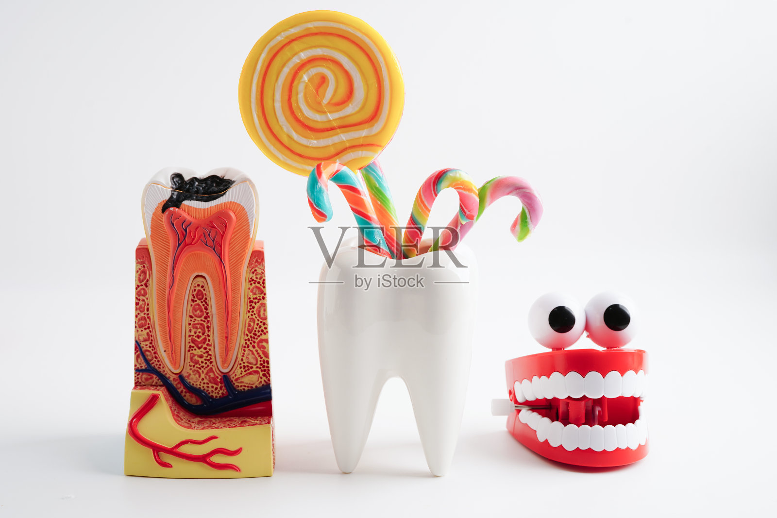 蛀牙用甜糖糖，不利于牙齿保健的食物。照片摄影图片