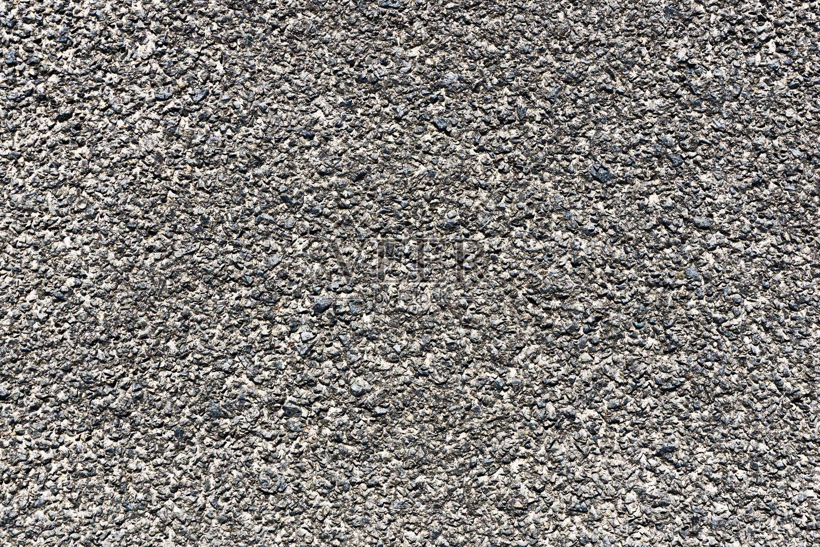 沥青纹理特写。黑暗的城市路面。照片摄影图片