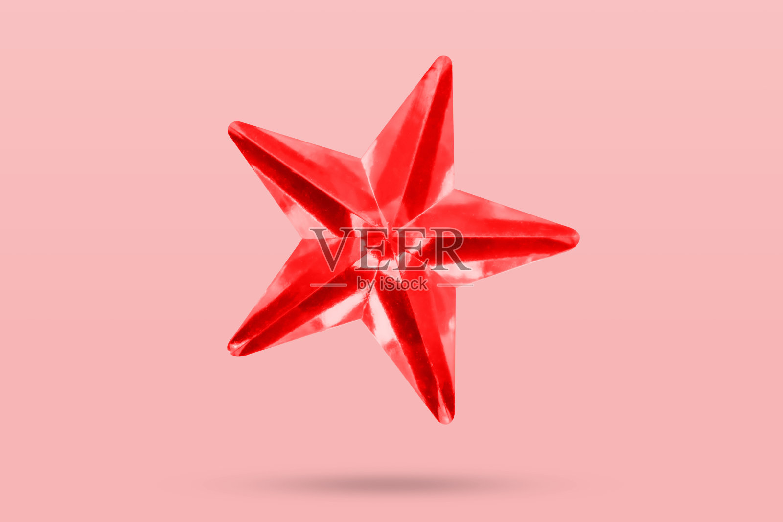 红星珠宝贴纸孤立在粉红色的背景照片摄影图片