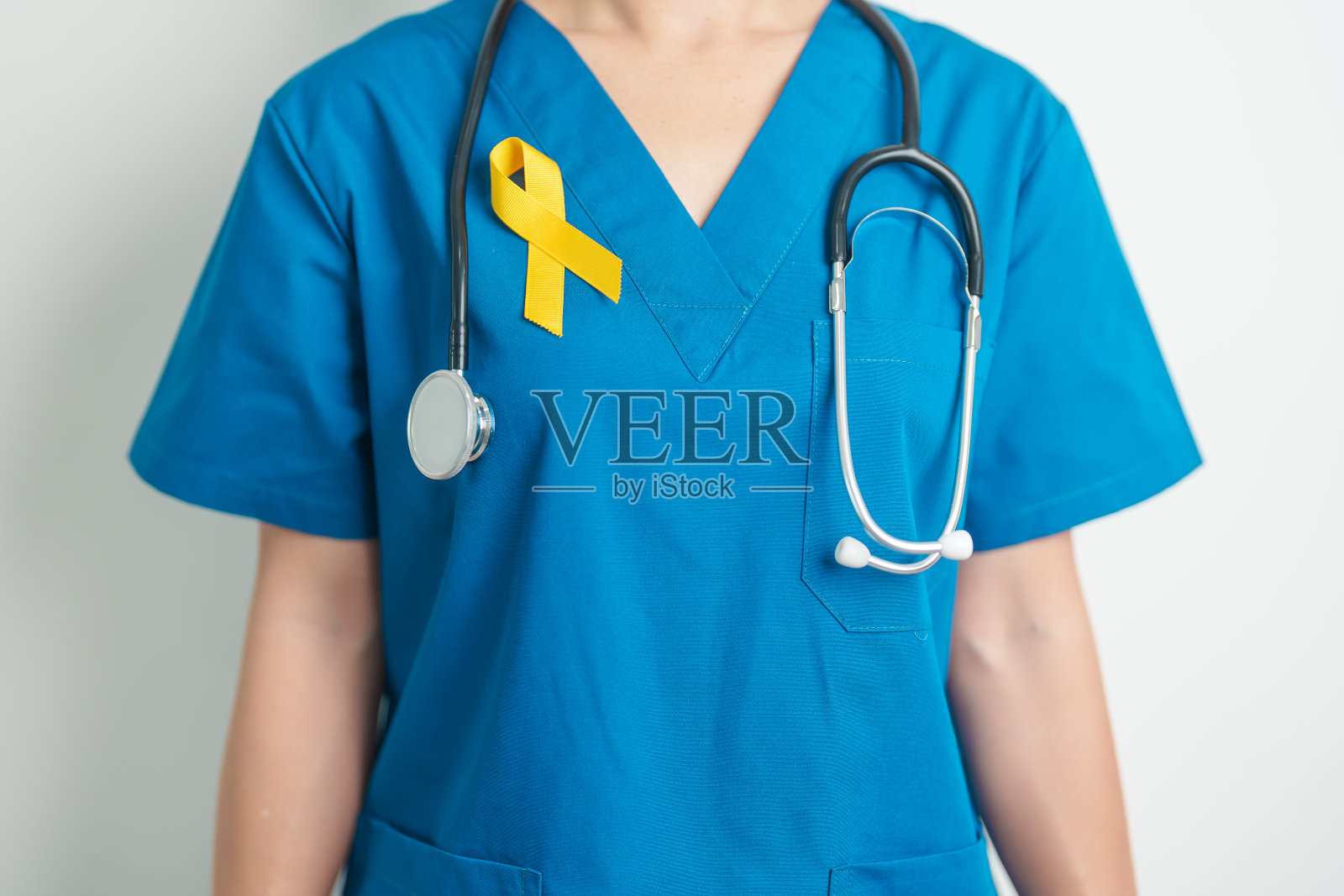 肉瘤癌日、黄色九月、预防自杀日、儿童、骨骼和膀胱癌宣传月，支持人们生活和对抗疾病的黄色丝带。健康与世界癌症日照片摄影图片