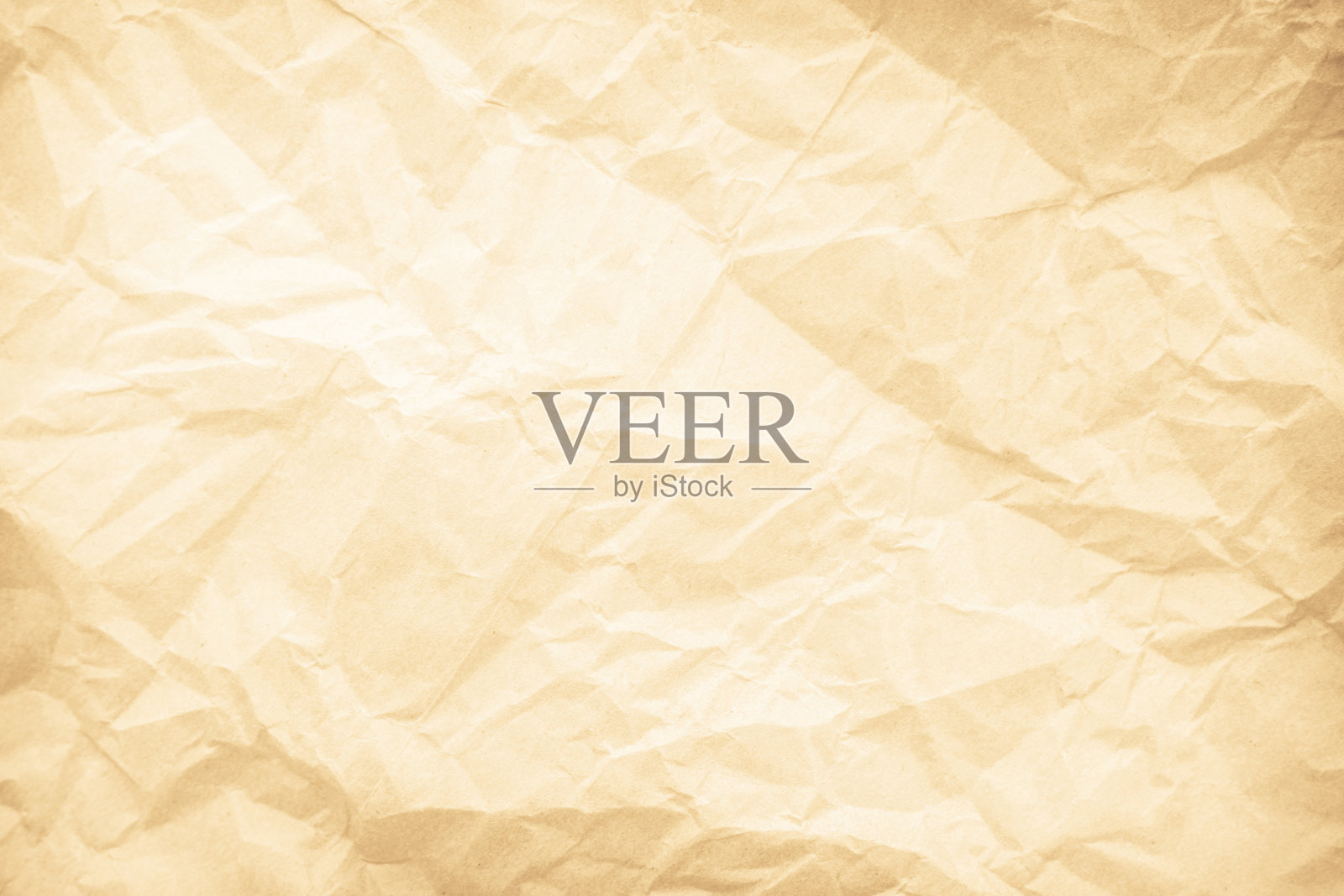 旧纸复古纹理表面为背景。回收的淡棕色纸有皱巴巴的纹理，奶油色回收的牛皮纸有皱巴巴的纹理，空白处留有文字的复制空间。照片摄影图片