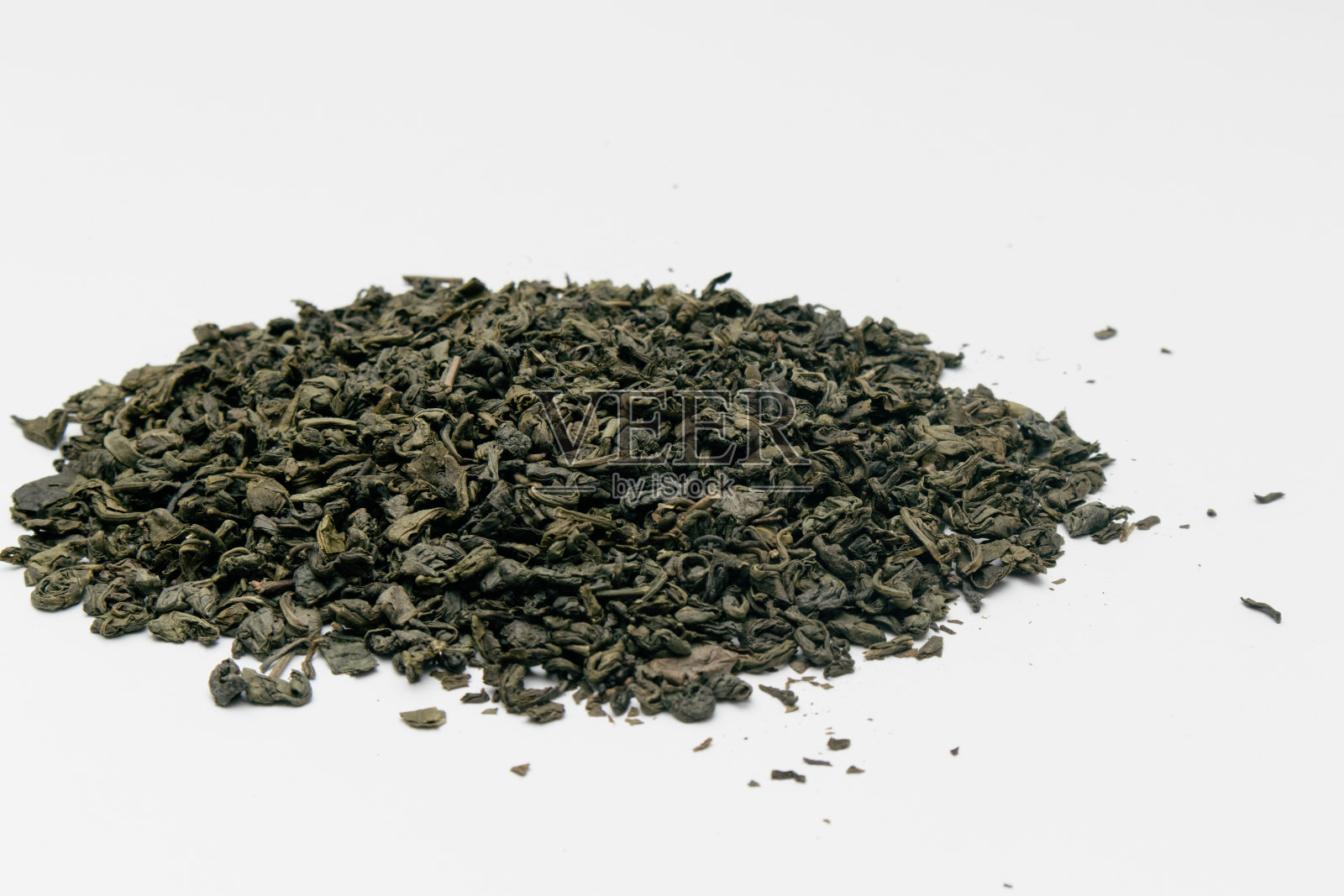一堆干绿茶孤立在白色的背景照片摄影图片