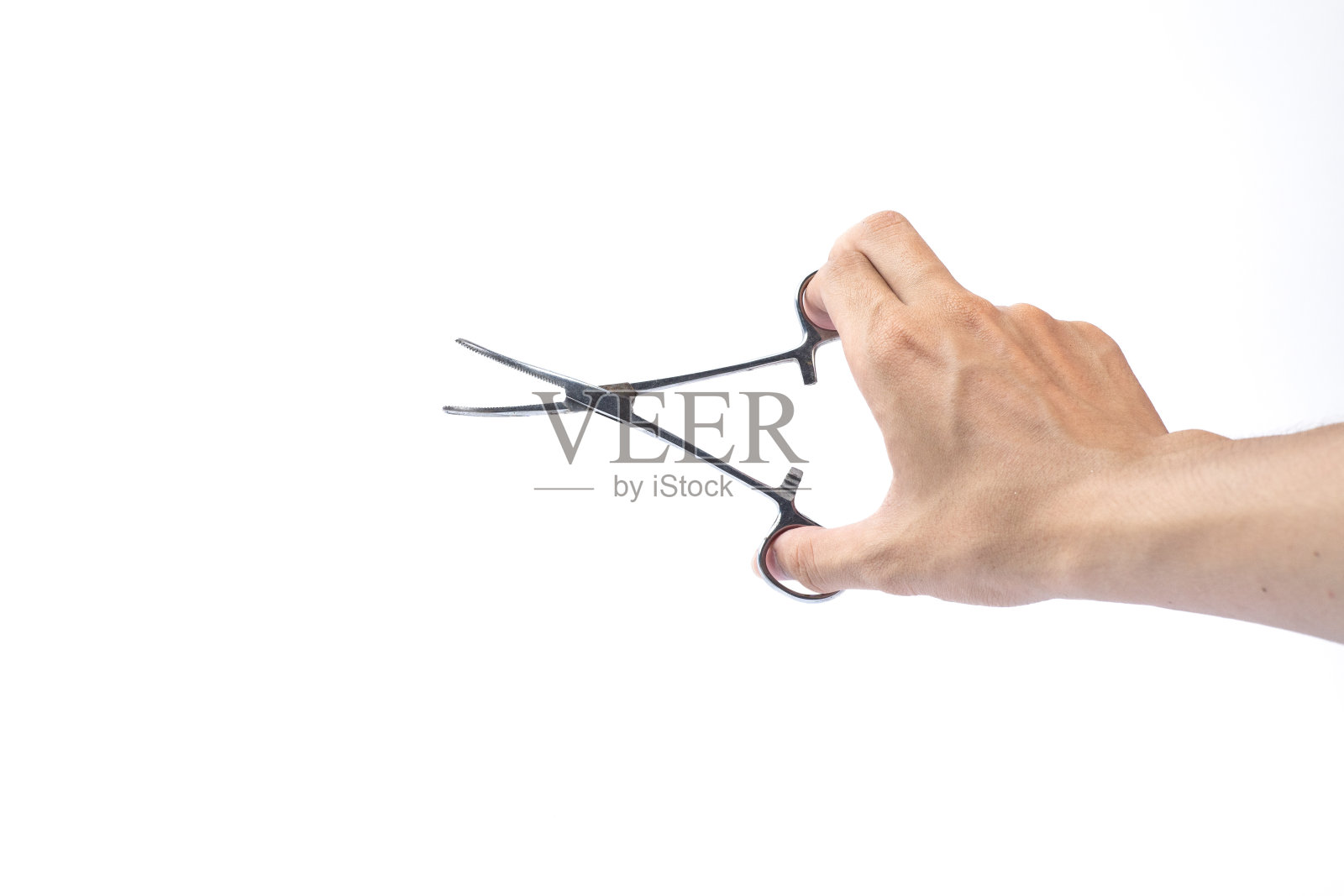 手持弯曲钳手术工具在白底，孤立的照片照片摄影图片
