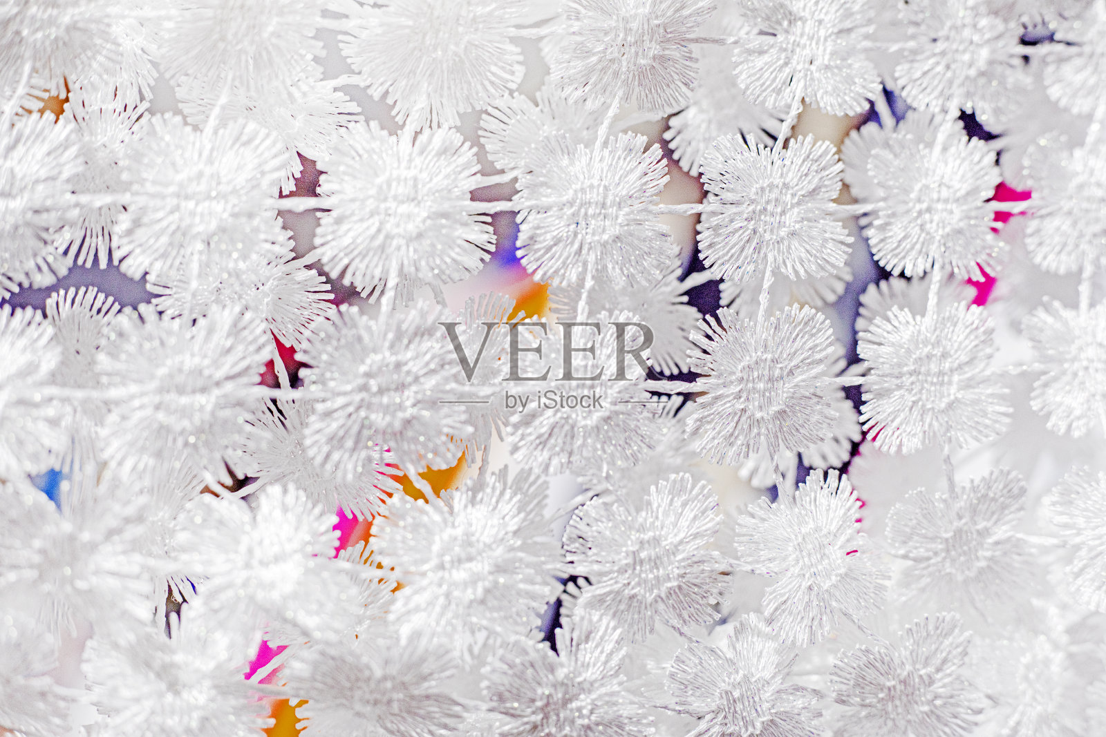 白色蕾丝的抽象背景以图案的形式出现在衣服上。时尚与风格照片摄影图片