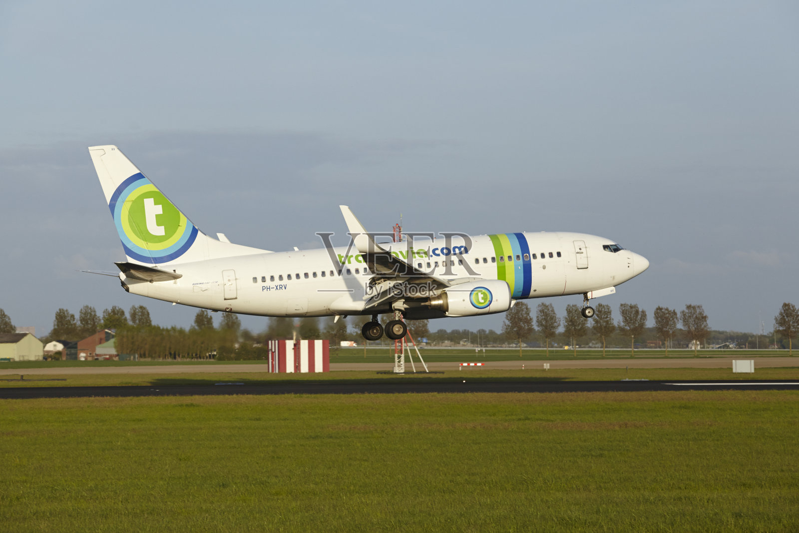 阿姆斯特丹史基浦机场- Transavia的波音737降落照片摄影图片