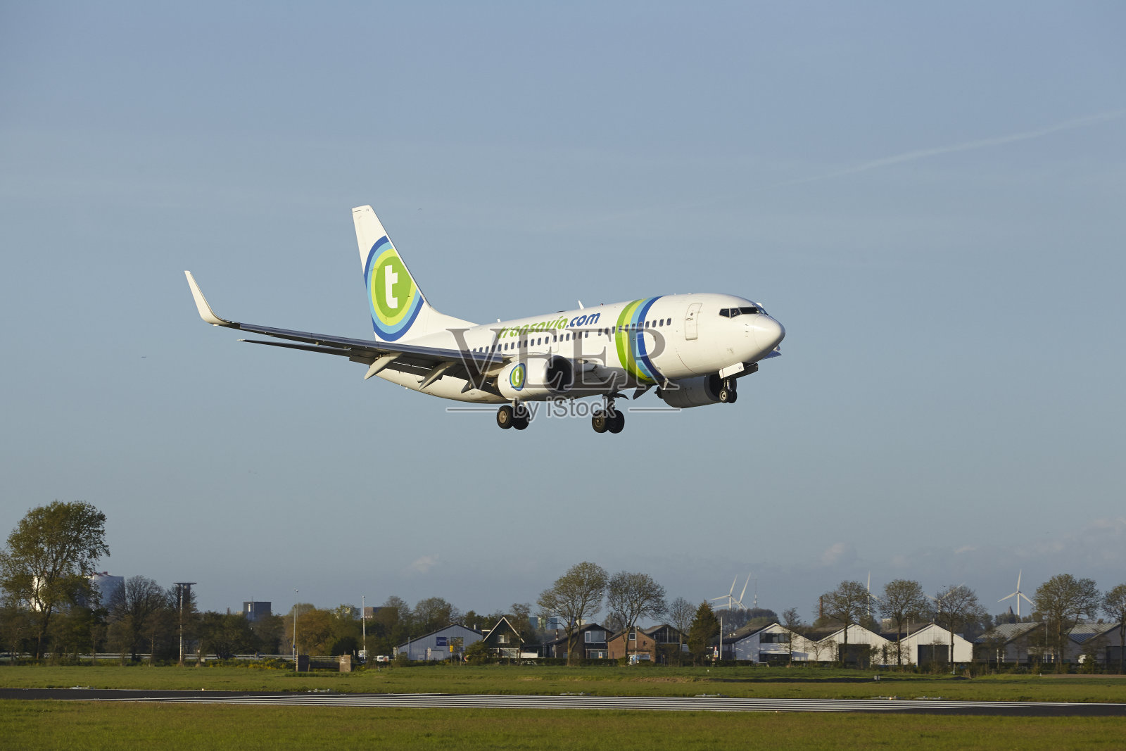 阿姆斯特丹史基浦机场- Transavia的波音737降落照片摄影图片