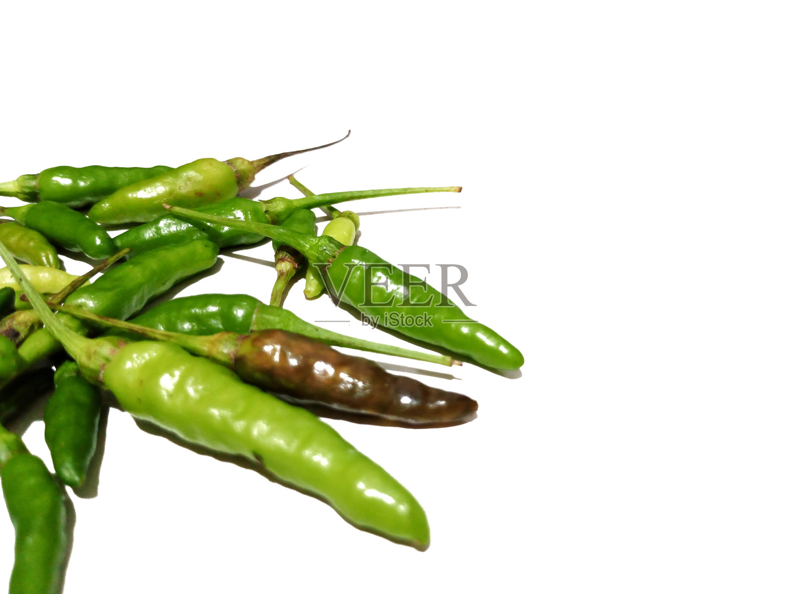 白色背景上的辣椒照片摄影图片