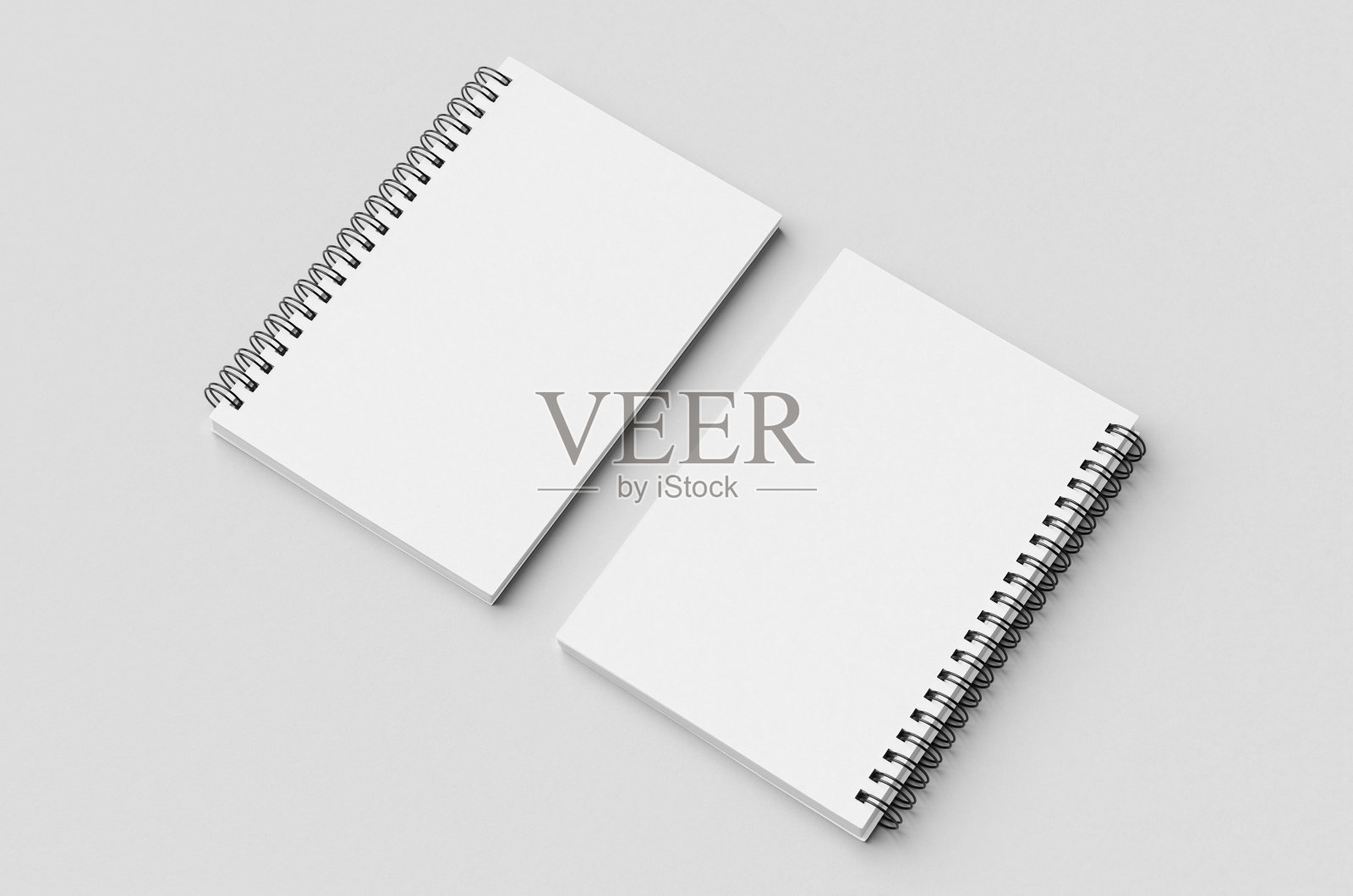 白色螺旋笔记本样机，封面和背面。照片摄影图片