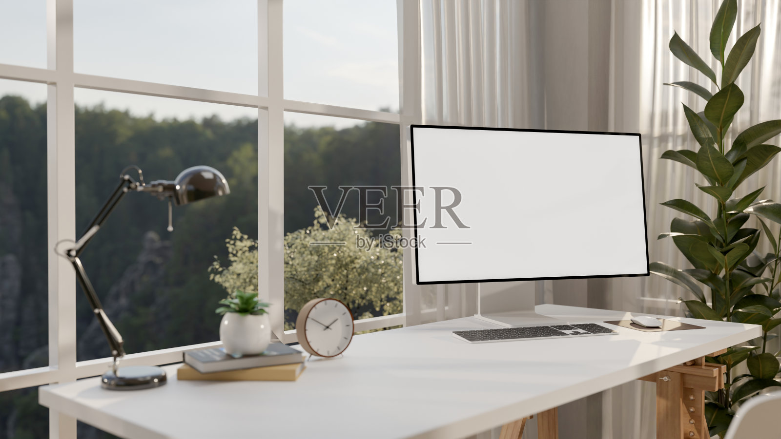 在一个简约的房间里，一张极简主义的白色电脑桌靠在窗户上，以电脑模型为特色。照片摄影图片