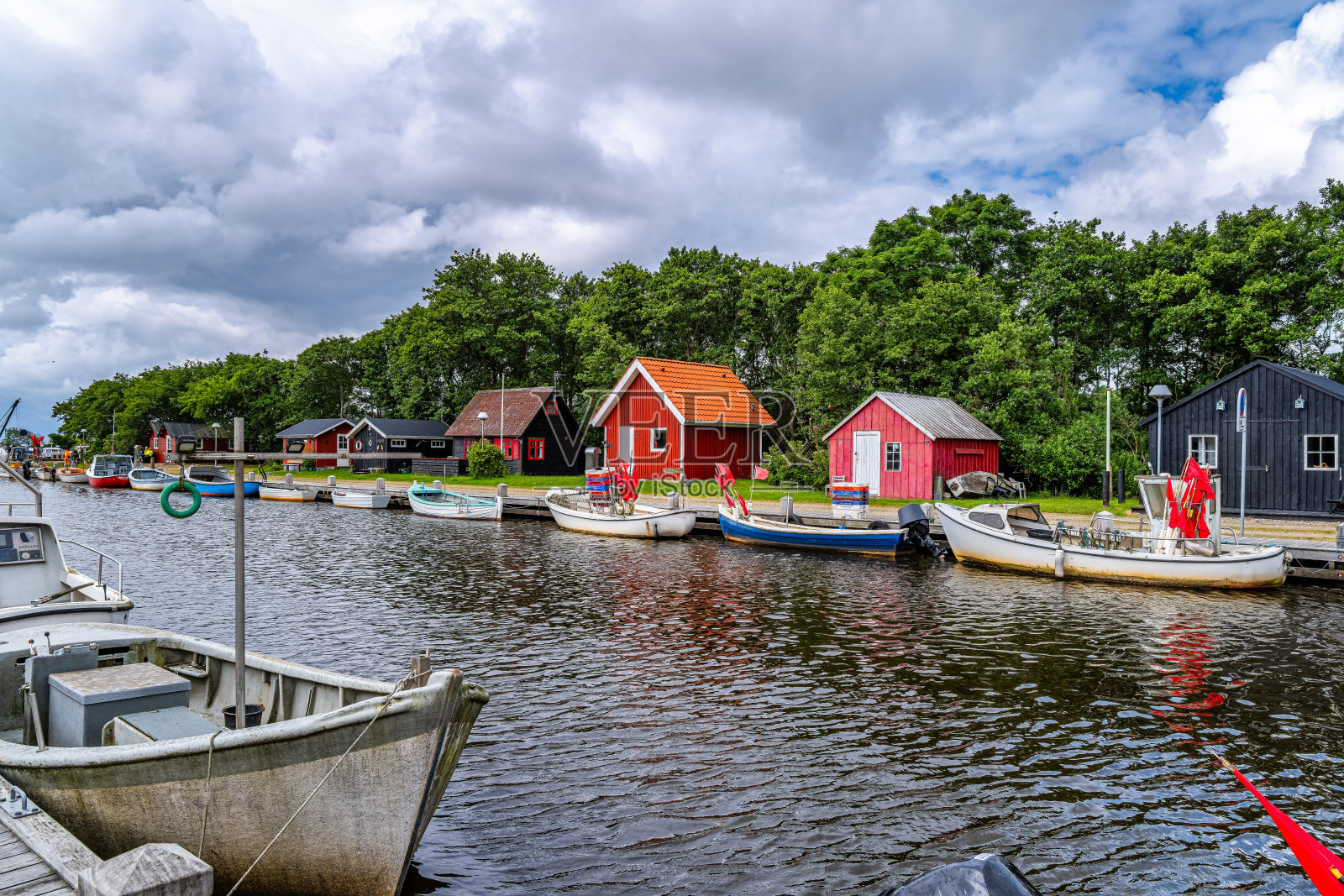 丹麦峡湾的斯汤宁港的小船照片摄影图片