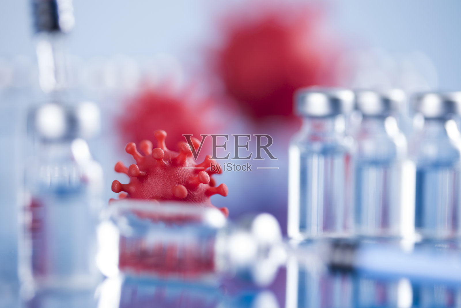 关闭注射疫苗的注射器照片摄影图片