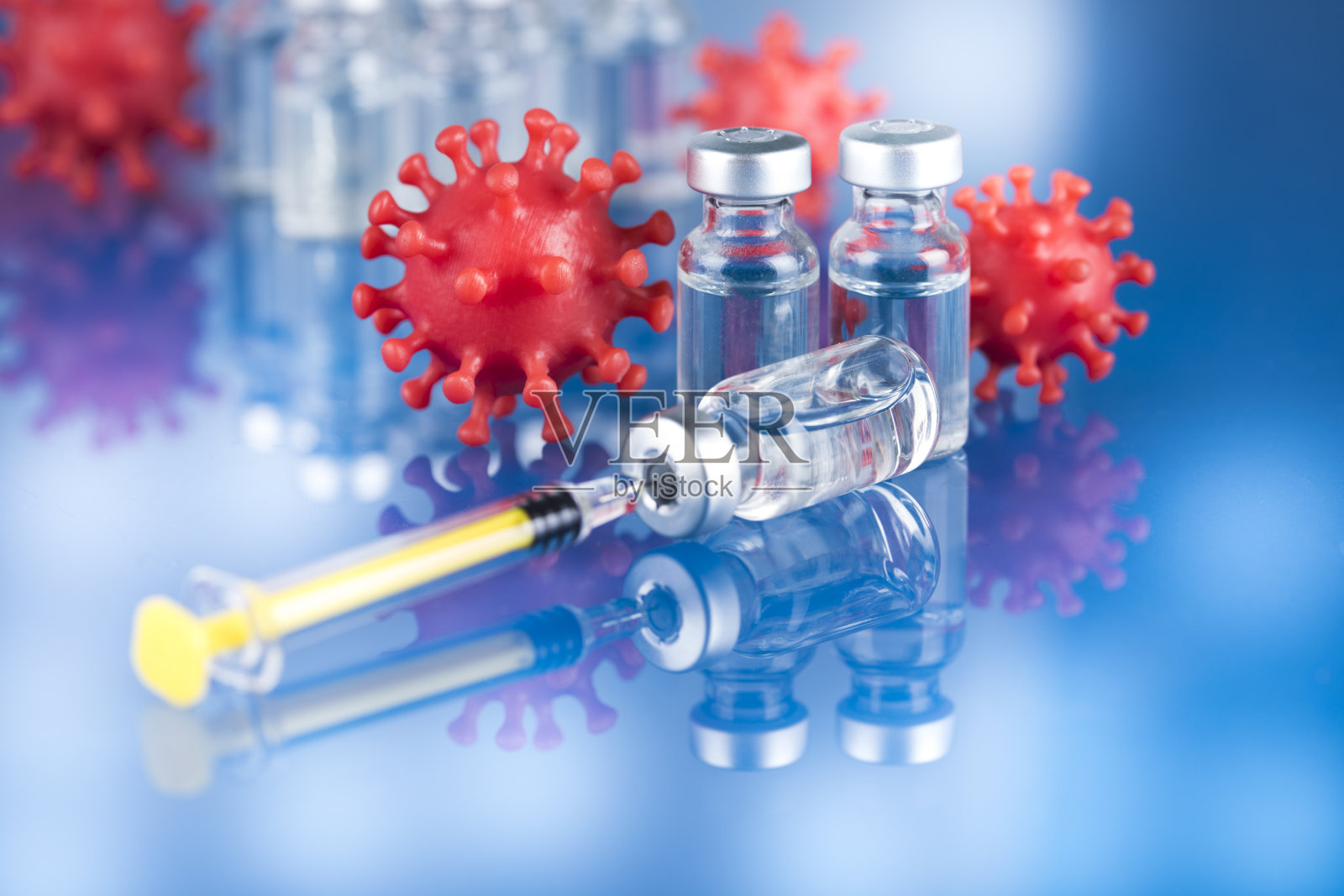 关闭注射疫苗的注射器照片摄影图片