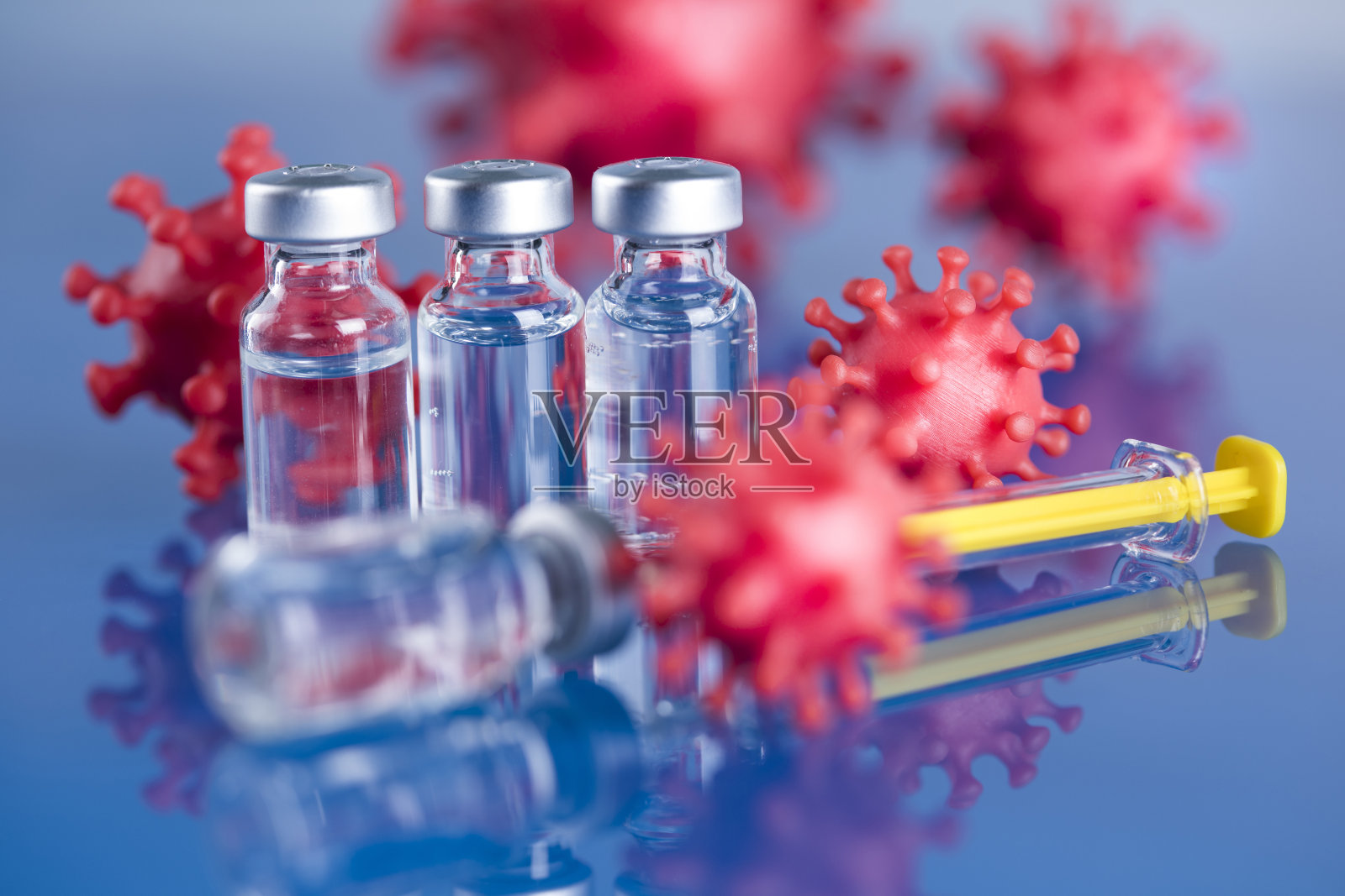 关闭注射疫苗的注射器照片摄影图片