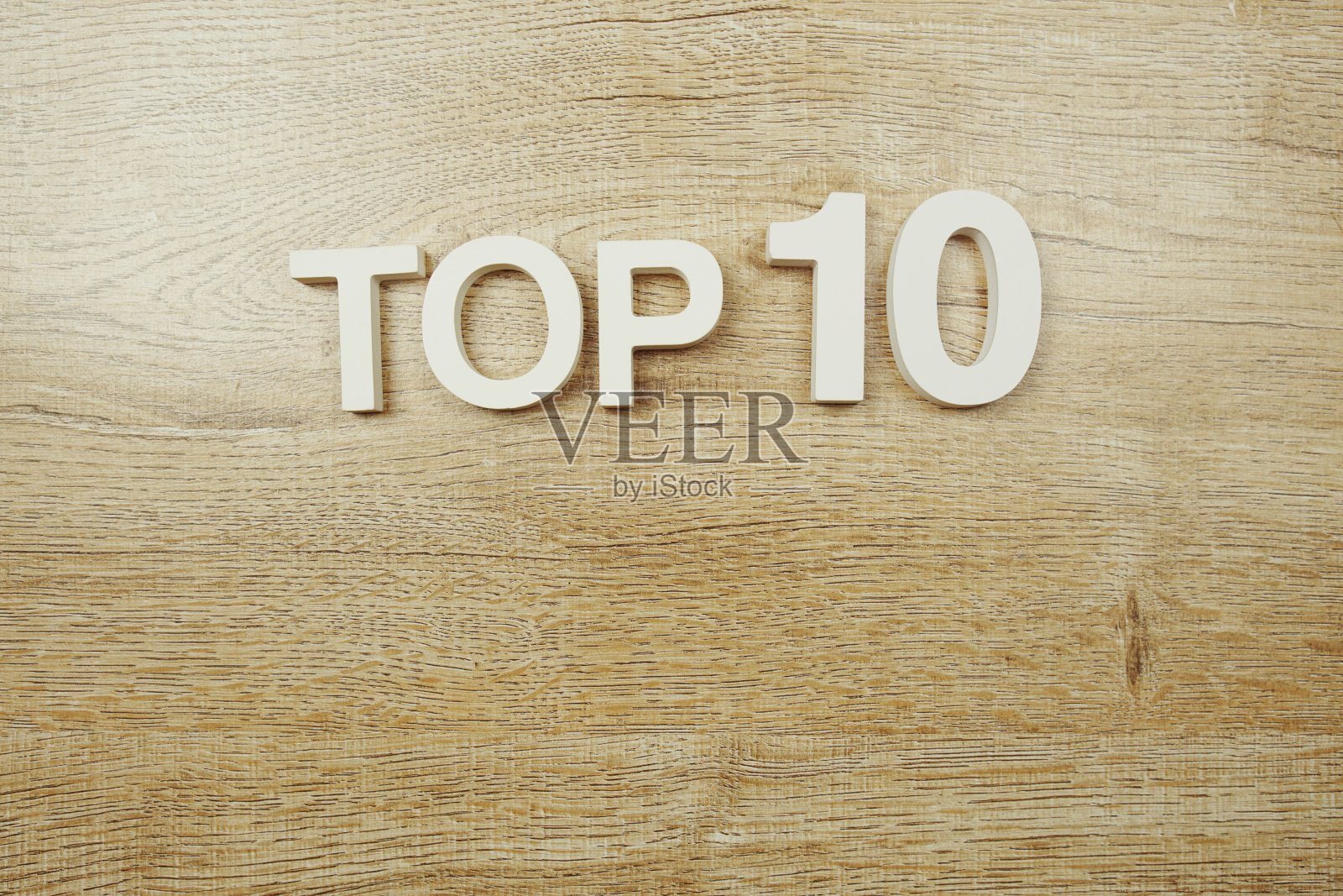 木制背景上的前10个单词字母照片摄影图片