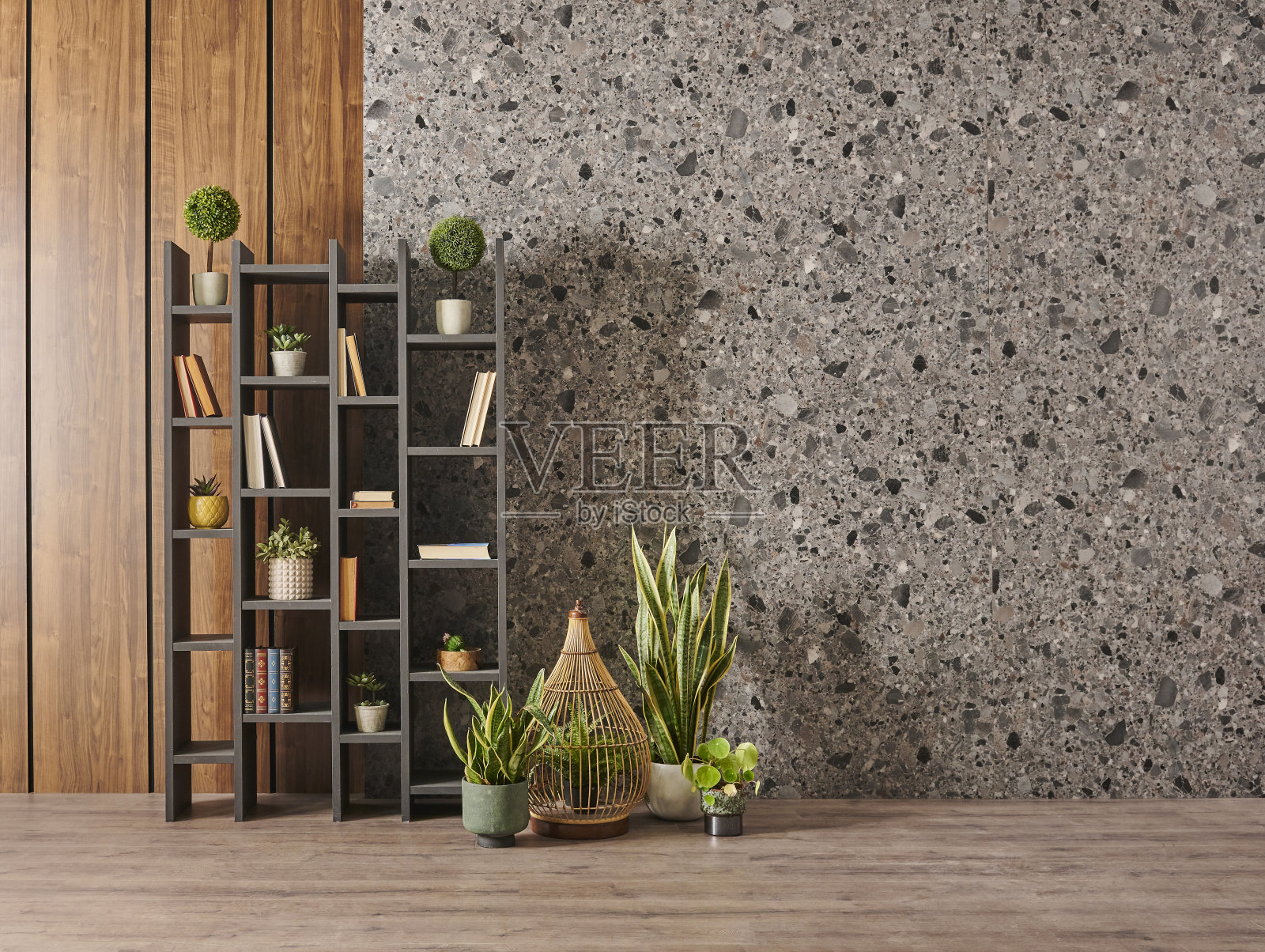 现代的家居装饰，灰色的书架和书籍，绿色植物花瓶，椅子，灰色大理石和木制背景墙。照片摄影图片