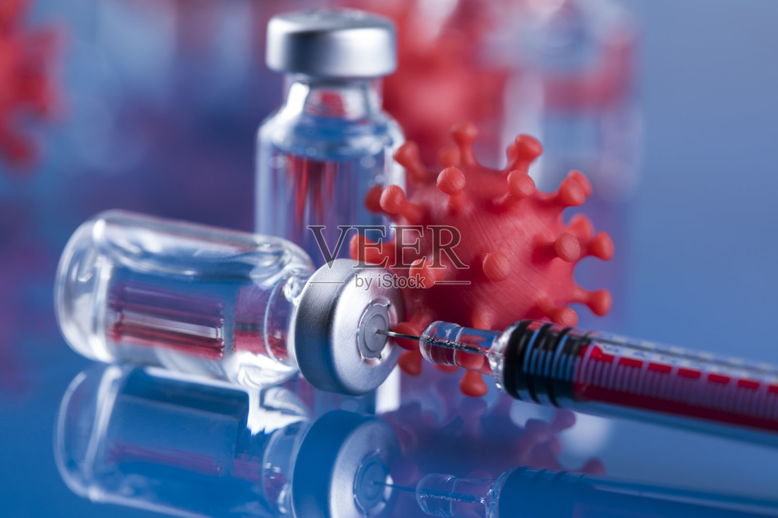 关闭注射疫苗的注射器照片摄影图片