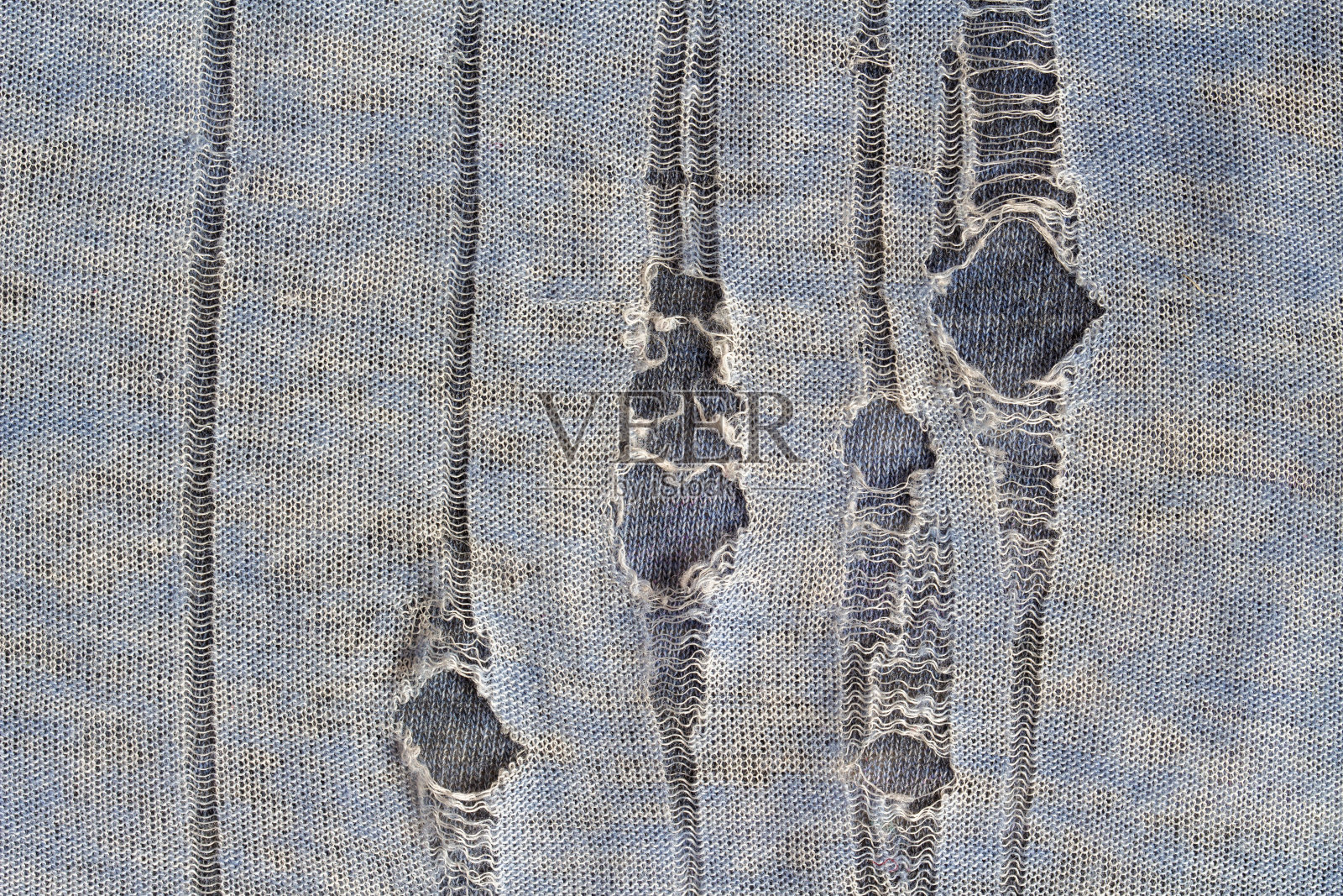 破旧的破布，有破洞照片摄影图片