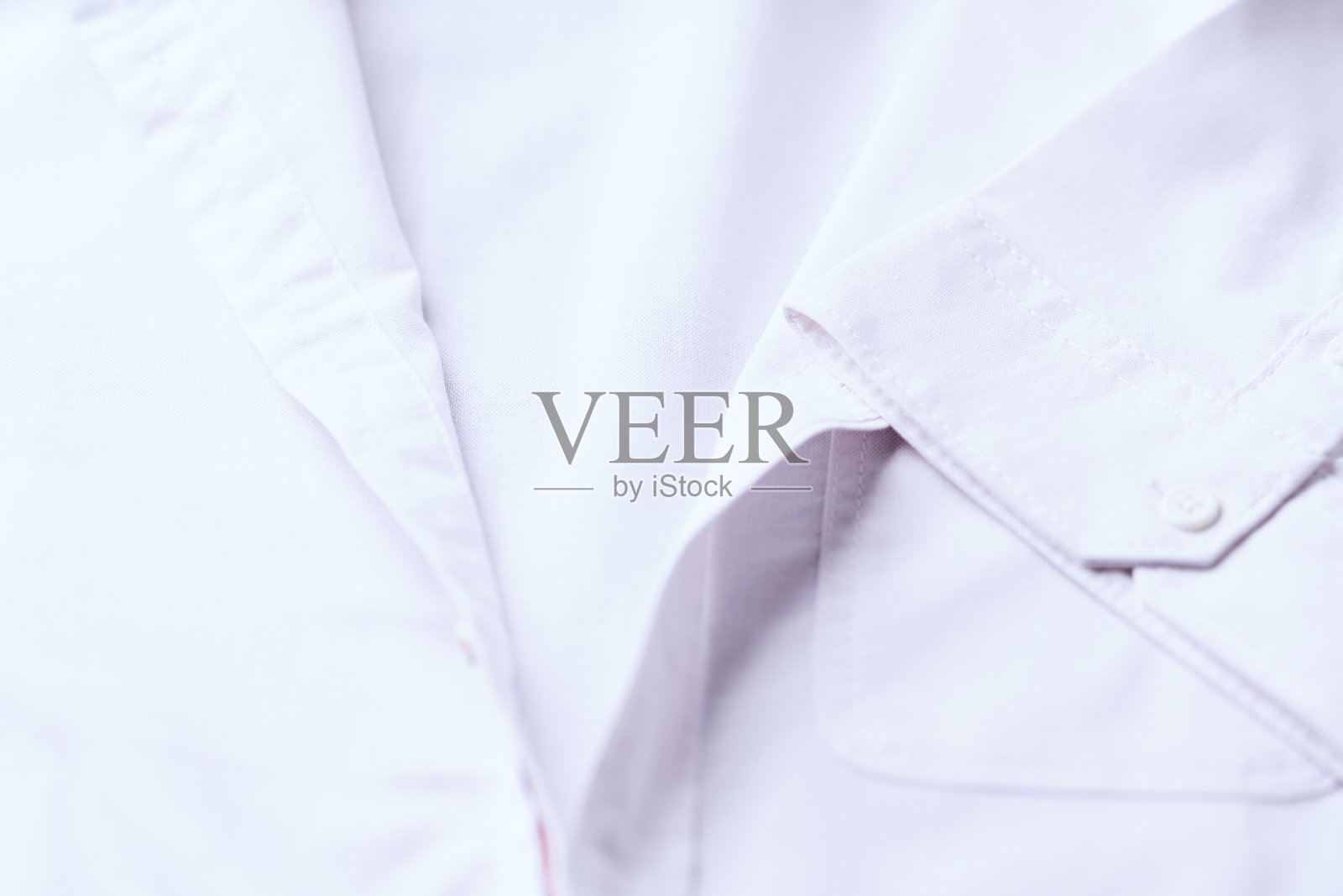 白色男士衬衫的特写。照片摄影图片