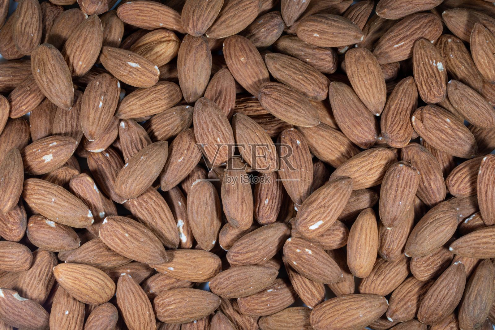 一堆生杏仁的特写照片摄影图片