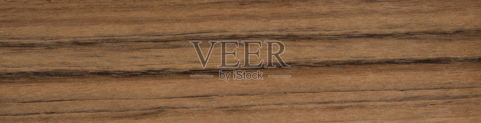 条纹达妮埃拉单板展示天然木材条纹和温暖的色调照片摄影图片