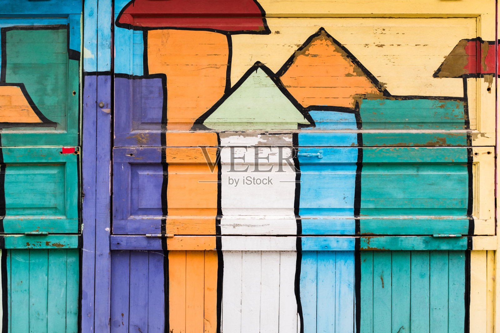 木墙上五颜六色的画照片摄影图片