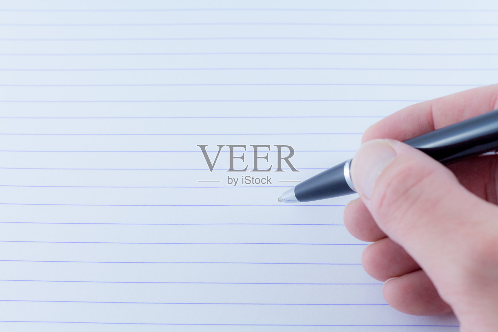 裁剪的手写在纸上照片摄影图片