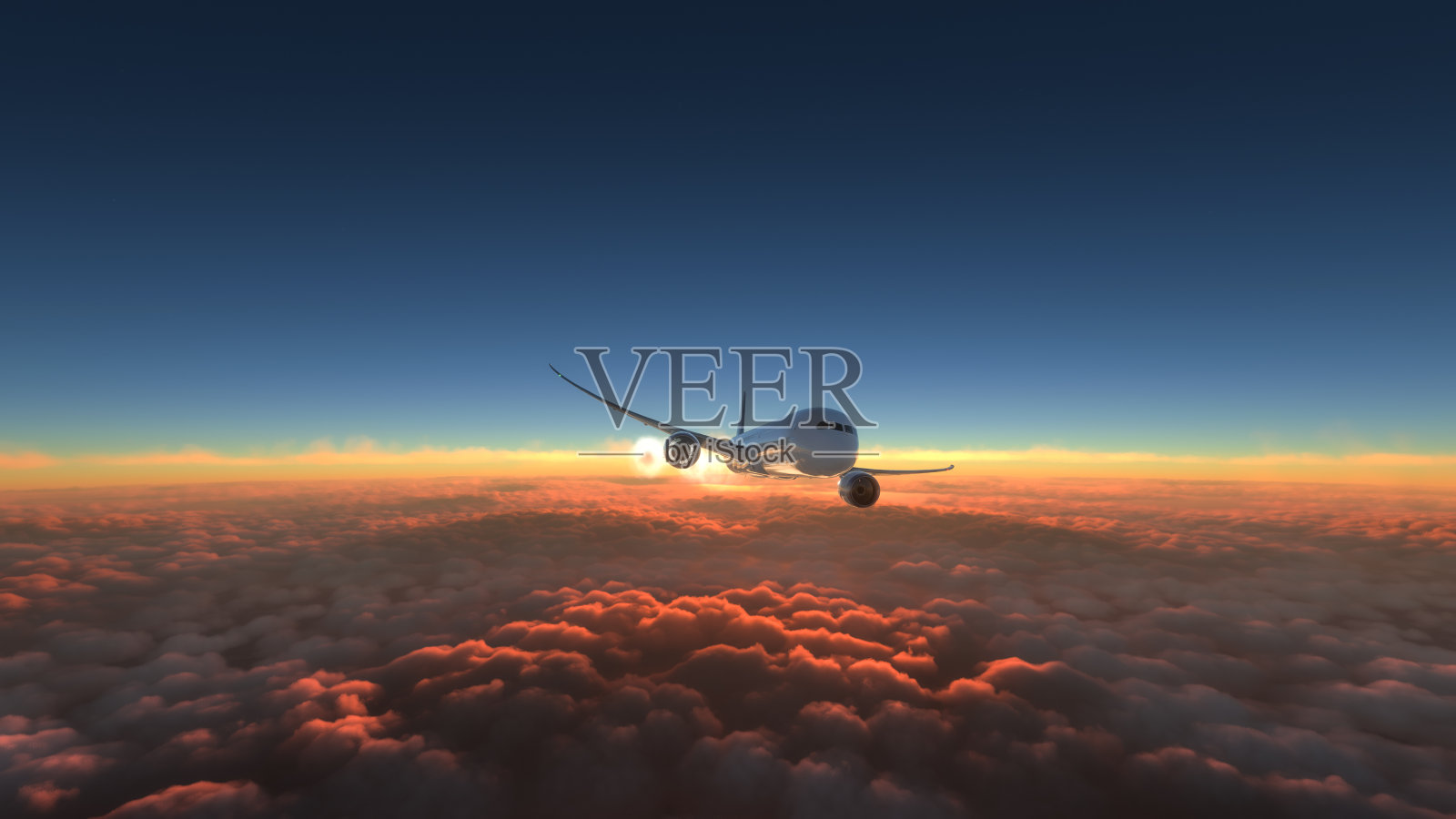 商用飞机飞过令人惊叹的日落照片摄影图片