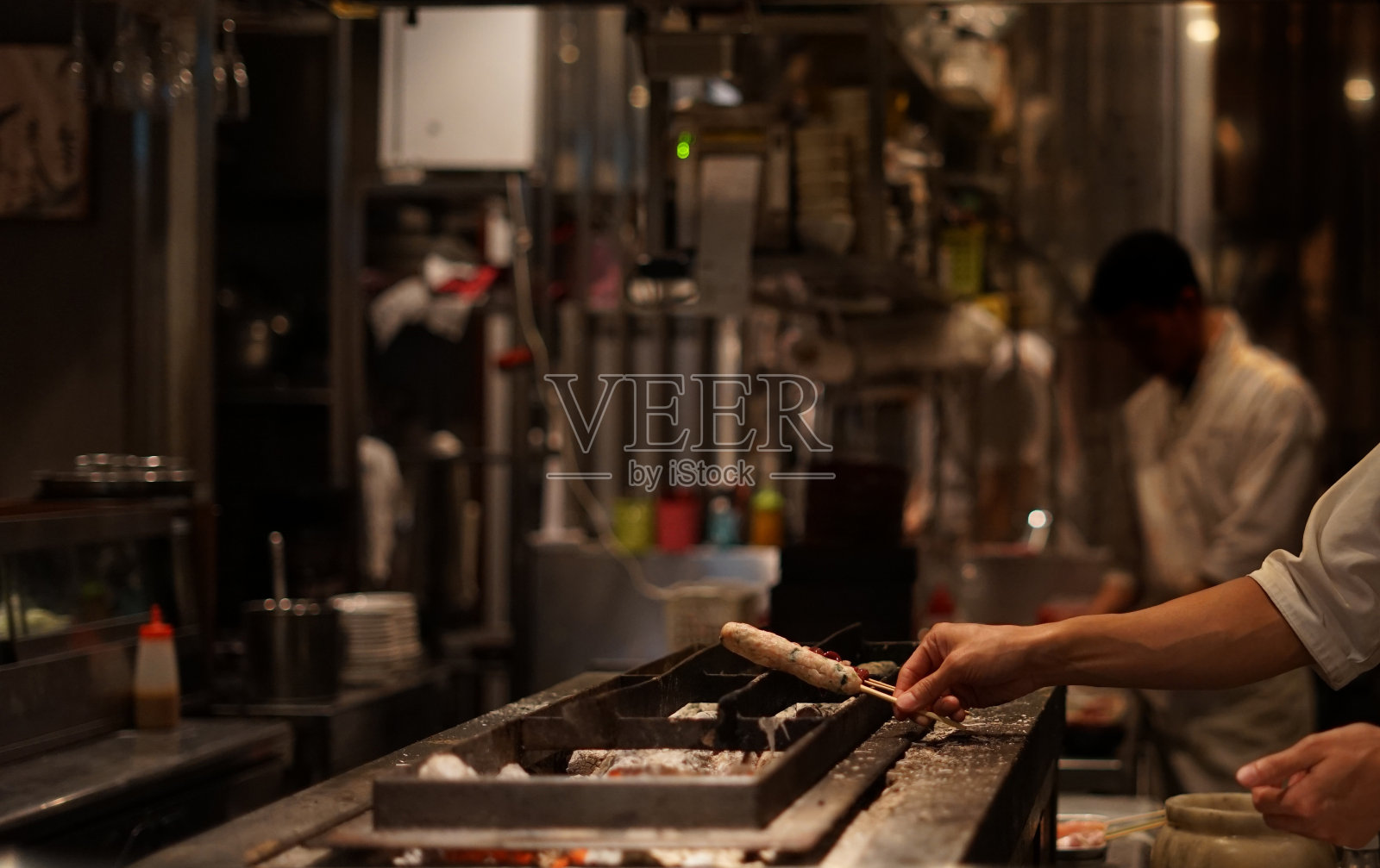 烤鸡肉串的烹饪区照片摄影图片