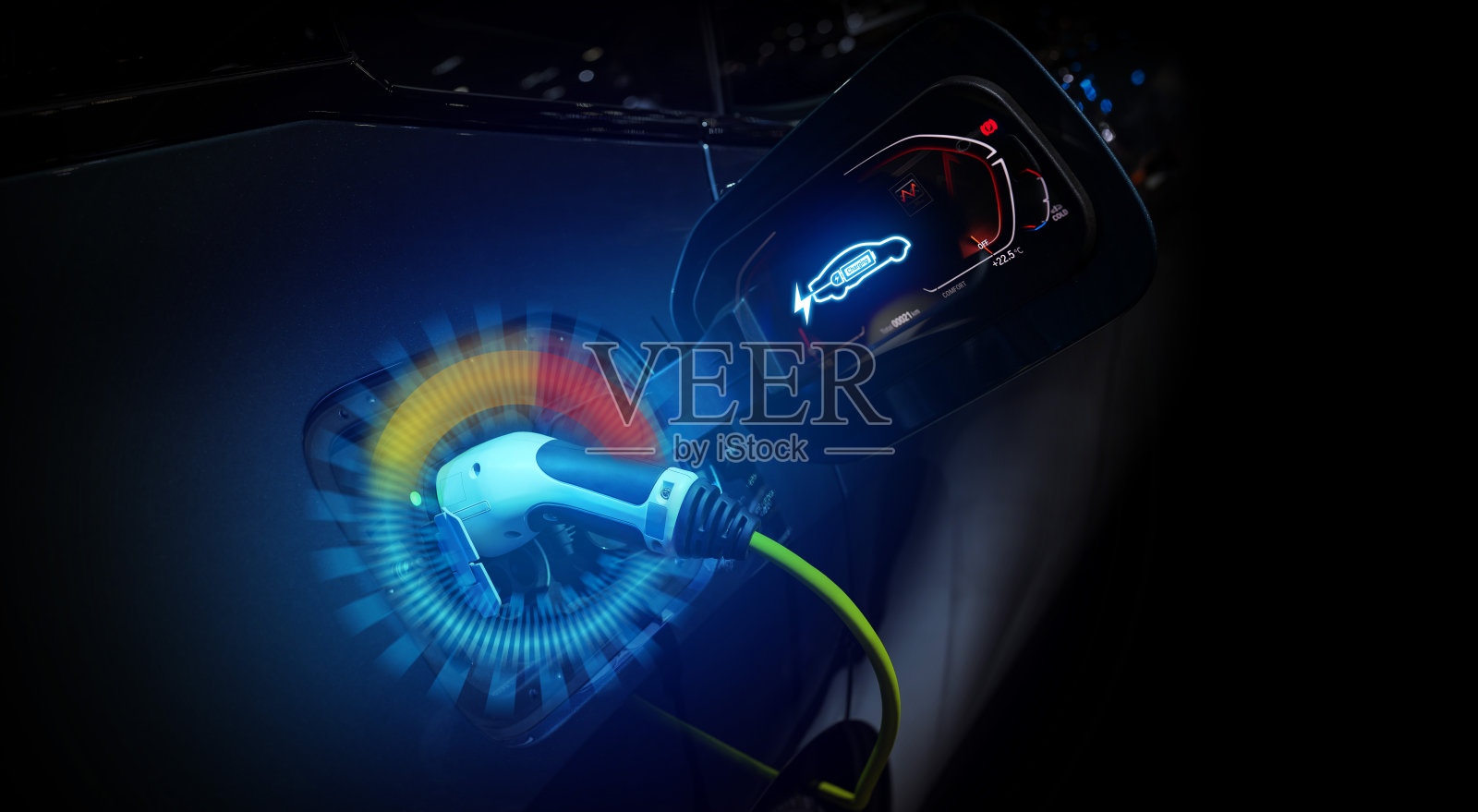 电力电缆泵插头为电动汽车充电供电。照片摄影图片