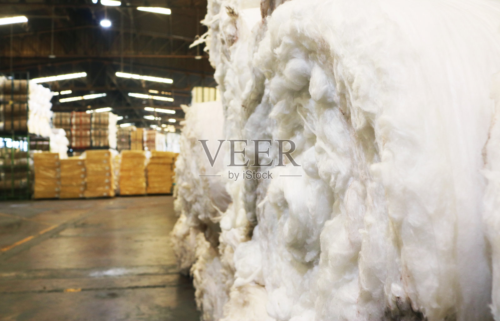 二氧化硅玻璃纤维针料堆辊背景。照片摄影图片