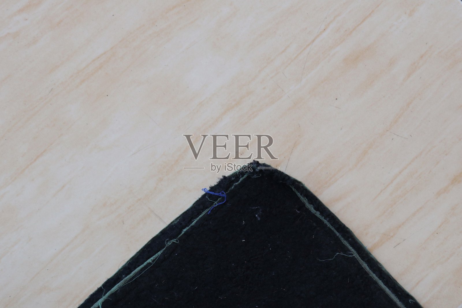 黑色脚垫表面纹理照片摄影图片