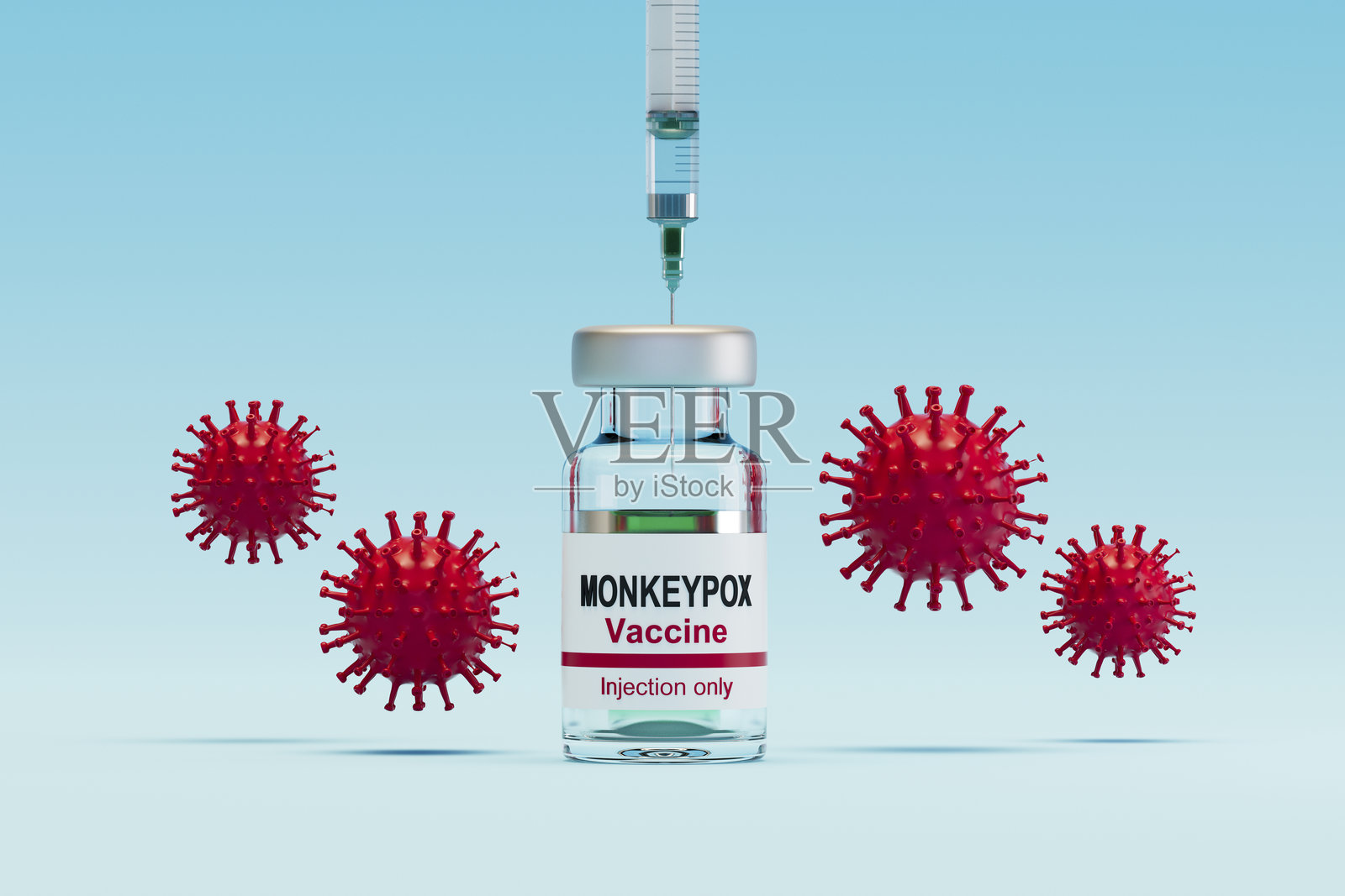 蓝色背景的猴痘病毒疫苗小瓶和注射器照片摄影图片