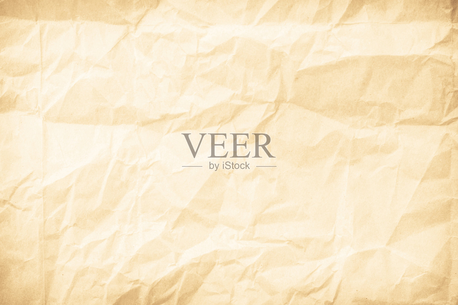 旧纸复古纹理表面为背景。回收的淡棕色纸有皱巴巴的纹理，奶油色回收的牛皮纸有皱巴巴的纹理，空白处留有文字的复制空间。照片摄影图片