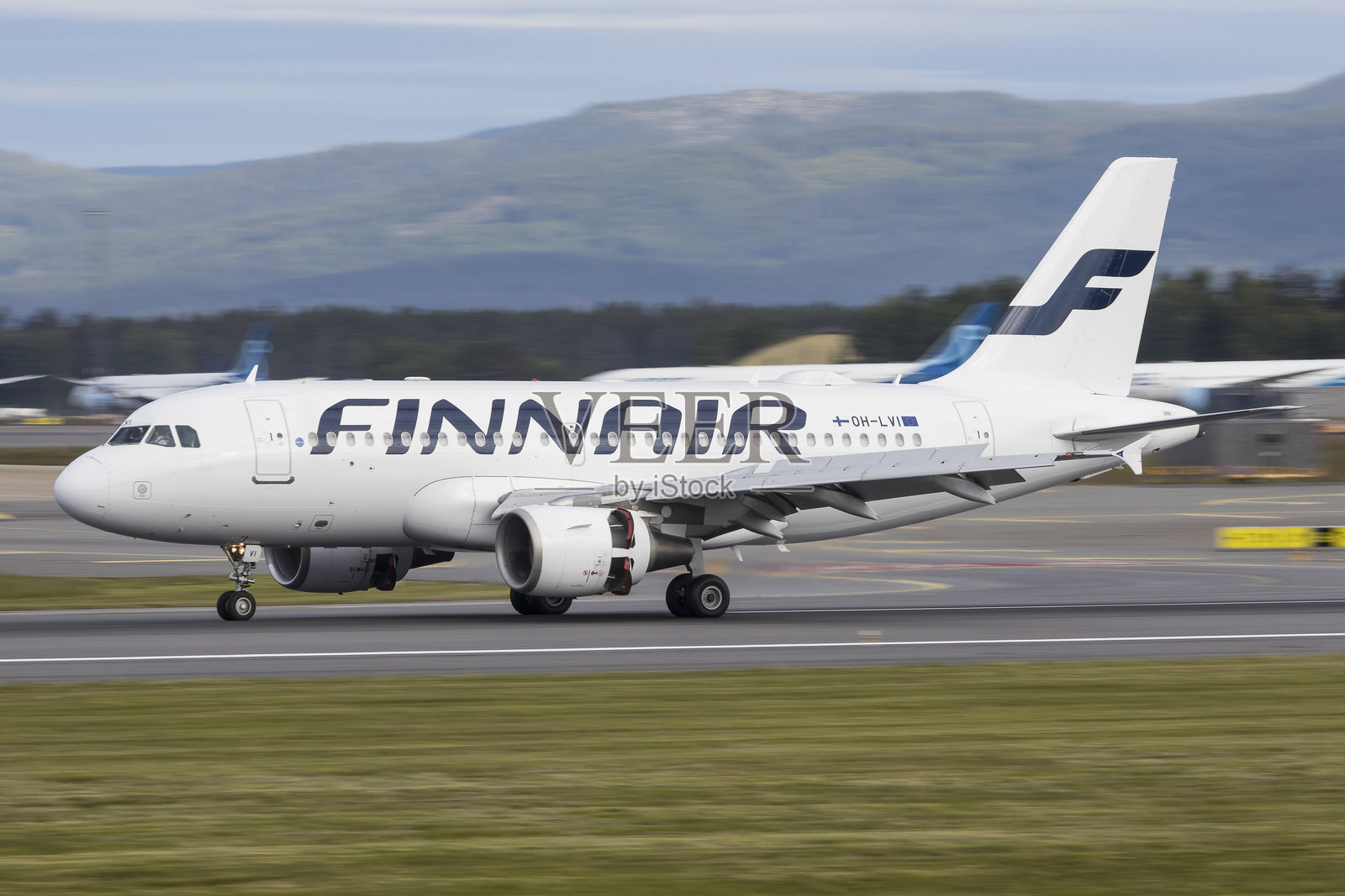 来自芬兰的芬兰航空公司正乘坐一架空客A319抵达奥斯陆机场照片摄影图片