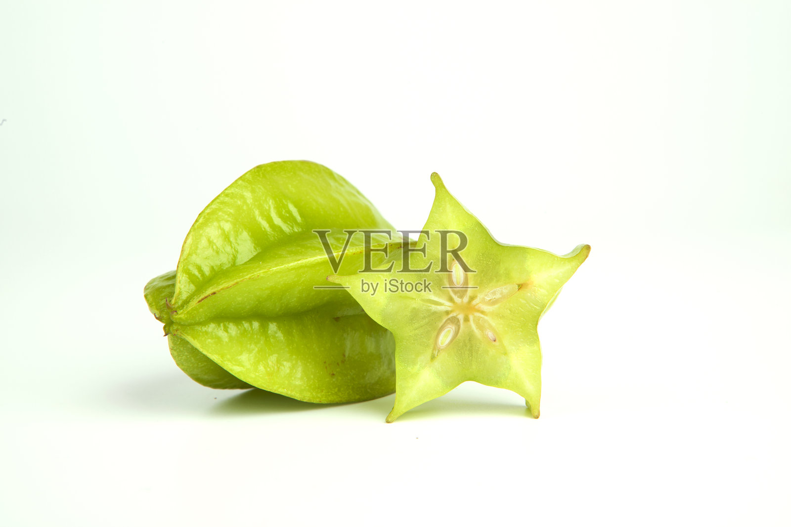 白色背景下的海星果照片摄影图片