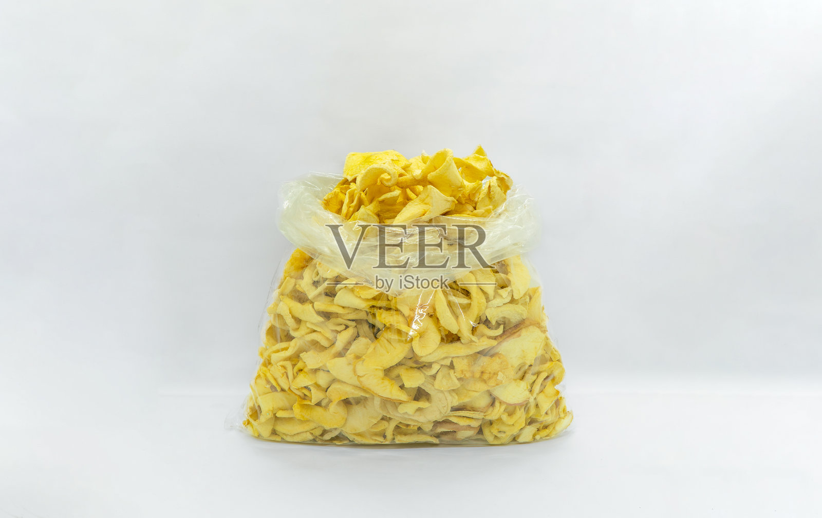 脱水美味看起来黄金干苹果健康干果野马马南苹果孤立的背景照片摄影图片