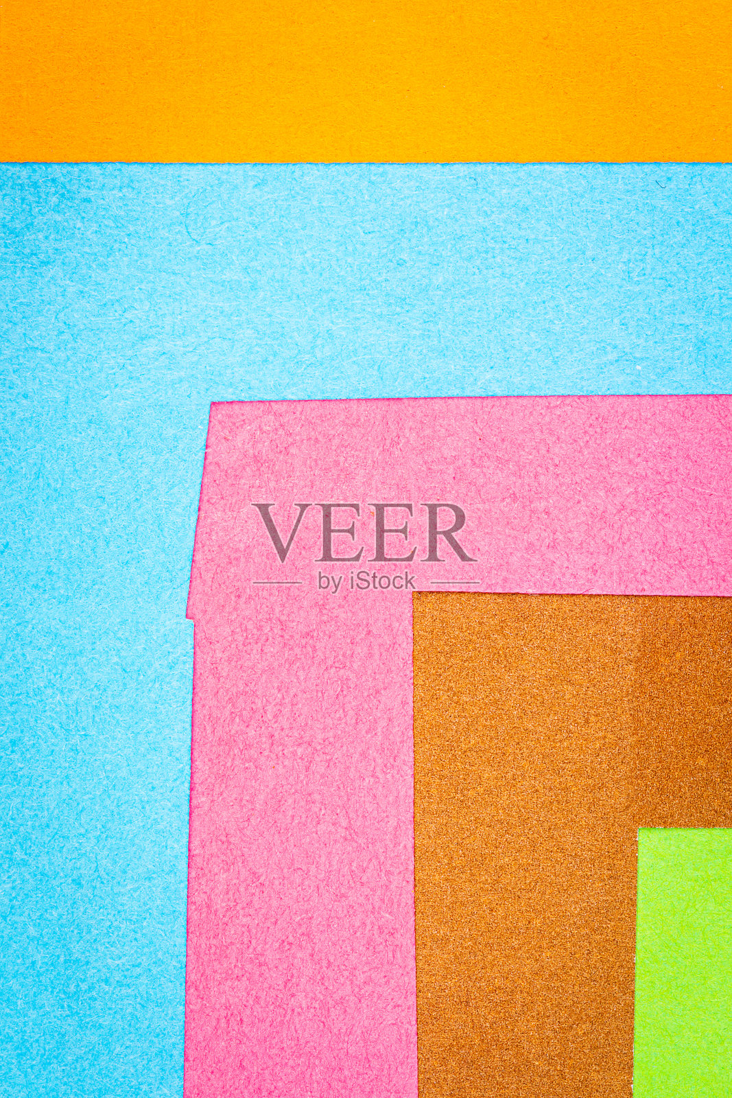 由不同颜色的纸张制成的多色背景照片摄影图片