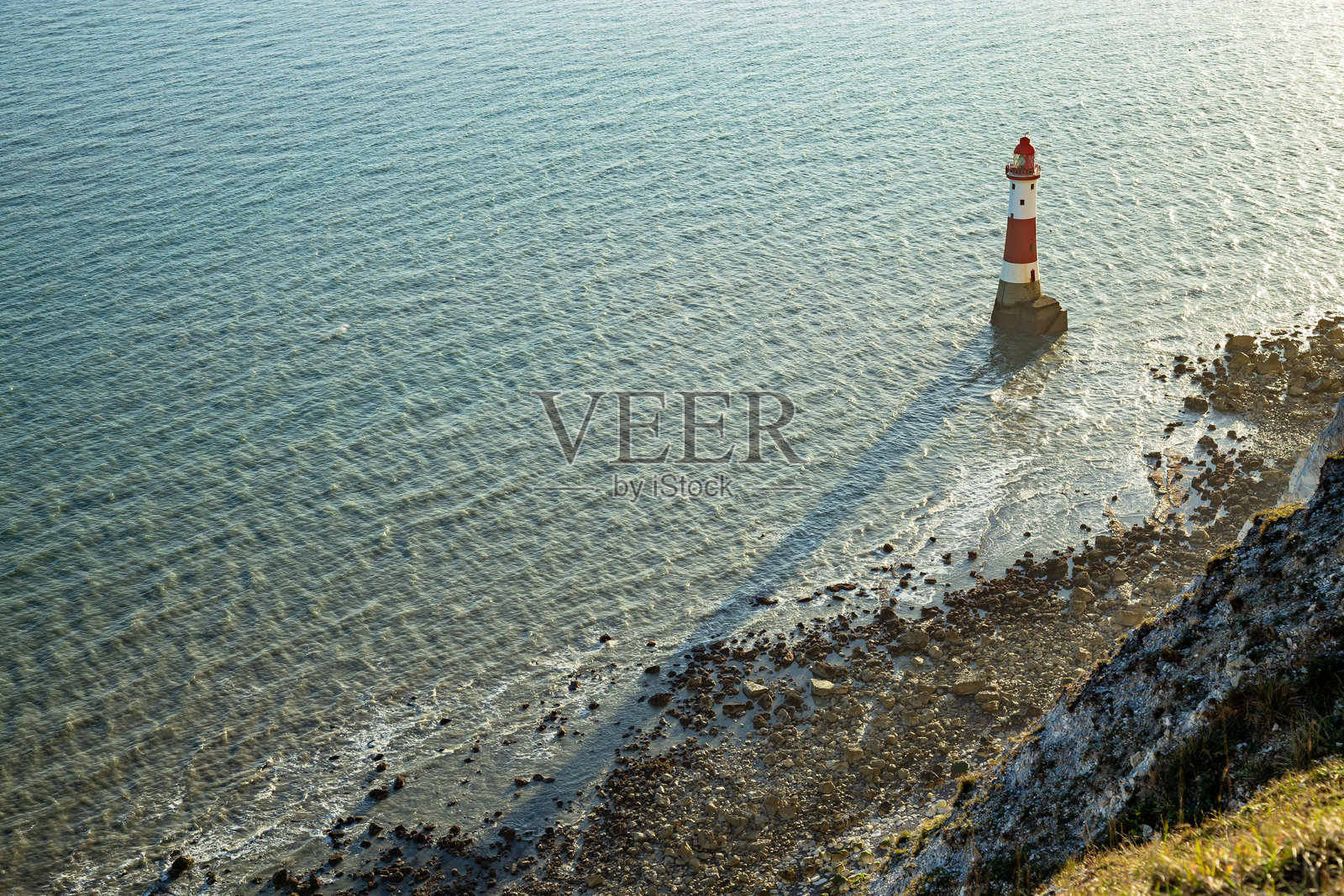 比奇角灯塔日落英格兰欧洲照片摄影图片