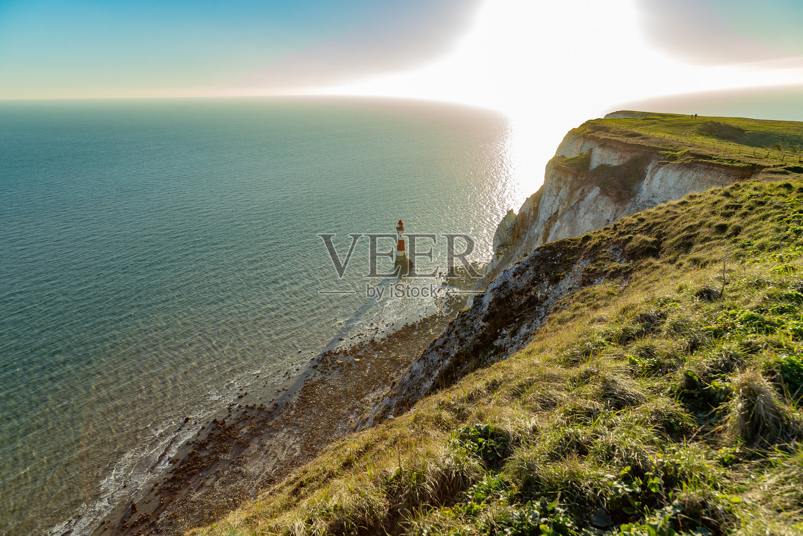 比奇角灯塔日落英格兰欧洲照片摄影图片