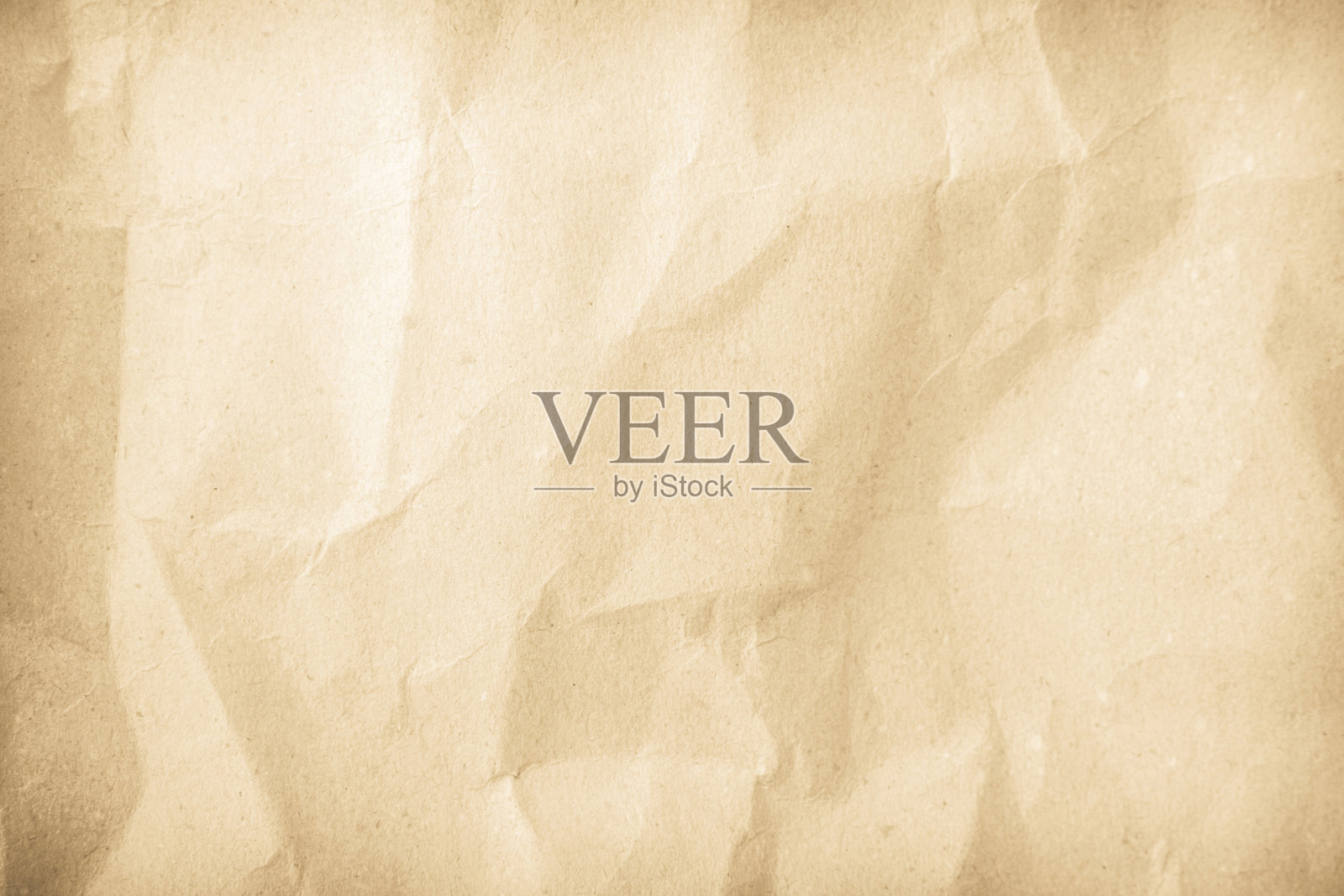 旧纸复古纹理表面为背景。回收的淡棕色纸有皱巴巴的纹理，奶油色回收的牛皮纸有皱巴巴的纹理，空白处留有文字的复制空间。照片摄影图片