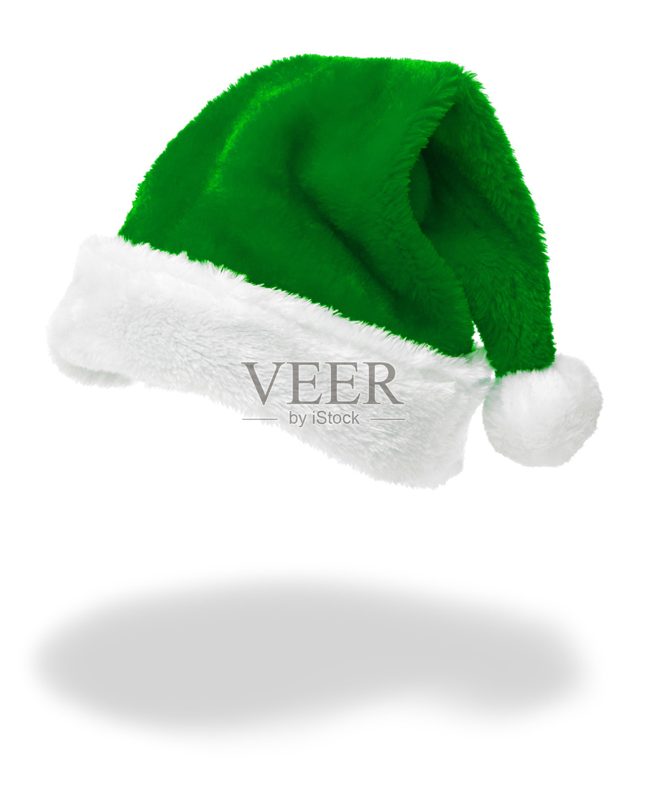 绿色的圣诞帽与一个影子孤立在白色照片摄影图片