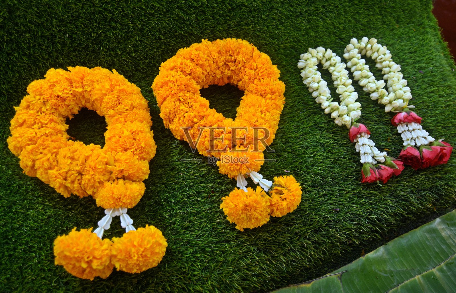 花卉花环-曼谷市场。照片摄影图片