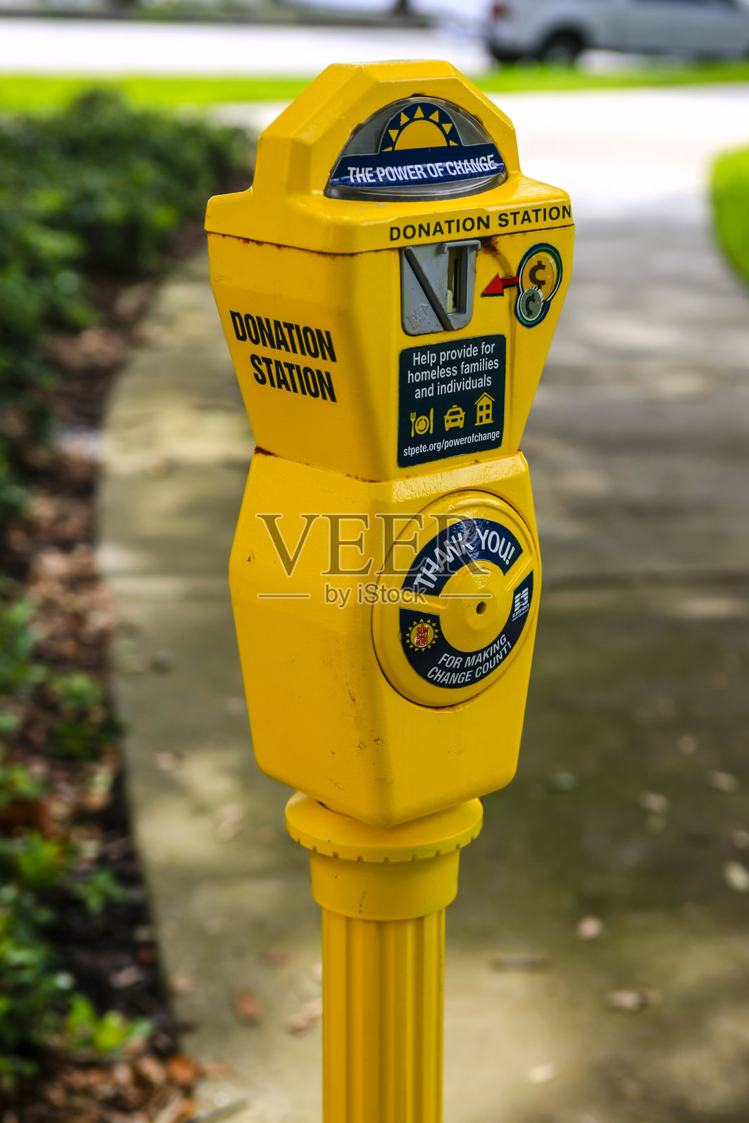 亮黄色捐赠站退休停车计时器照片摄影图片