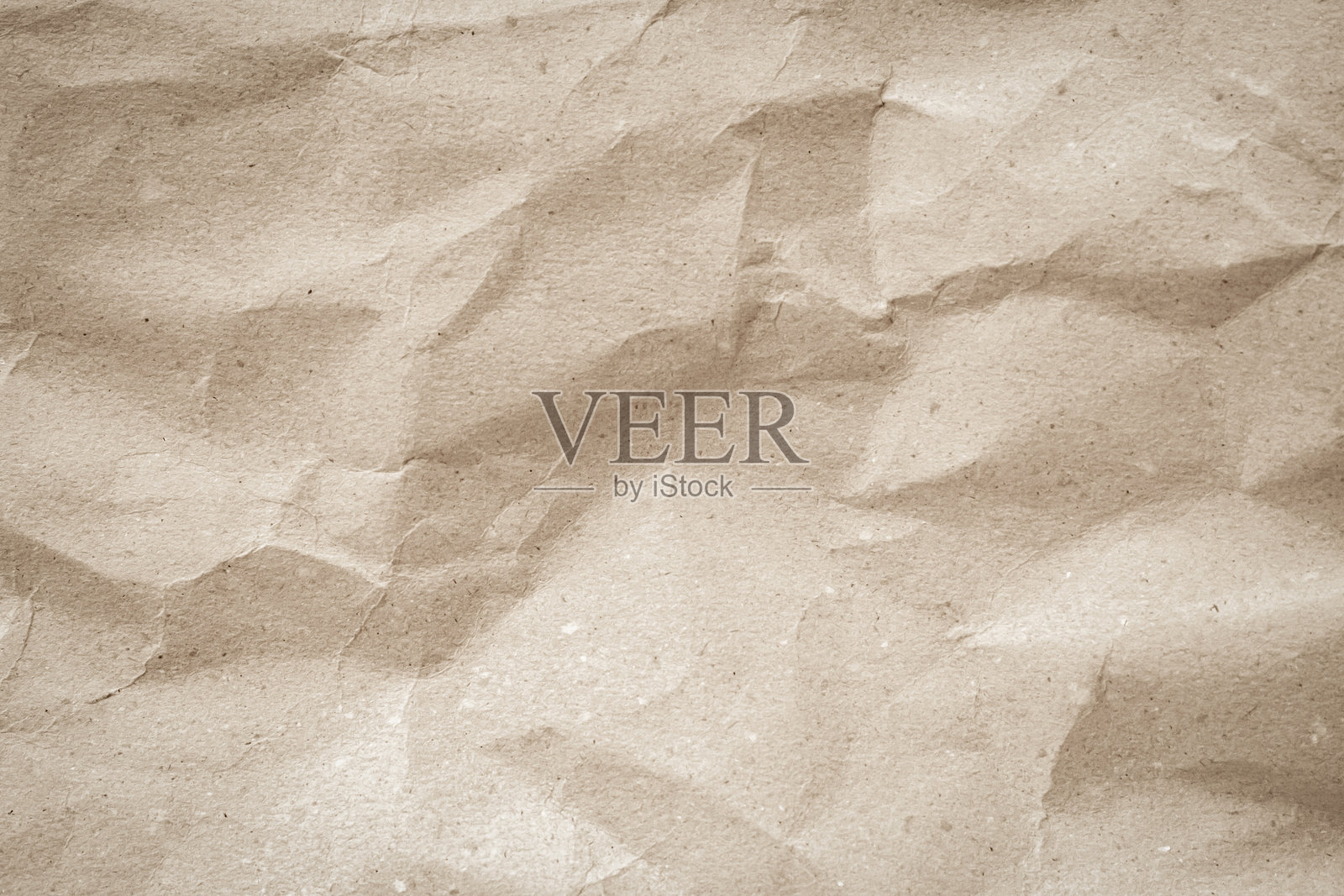 旧纸复古纹理表面为背景。回收的淡棕色纸有皱巴巴的纹理，奶油色回收的牛皮纸有皱巴巴的纹理，空白处留有文字的复制空间。照片摄影图片